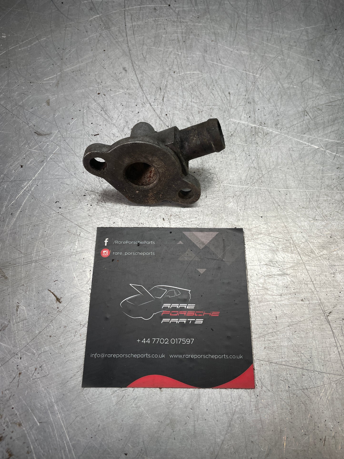 Porsche 928 S4 connection piece, used 9281047132R