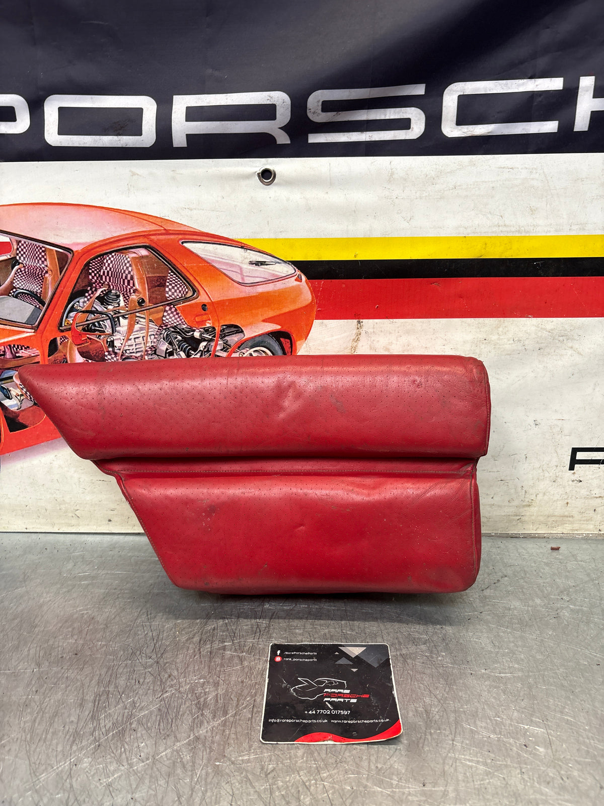 Porsche 928 rear left seat cushion, can-can red , leather, used 92852205951