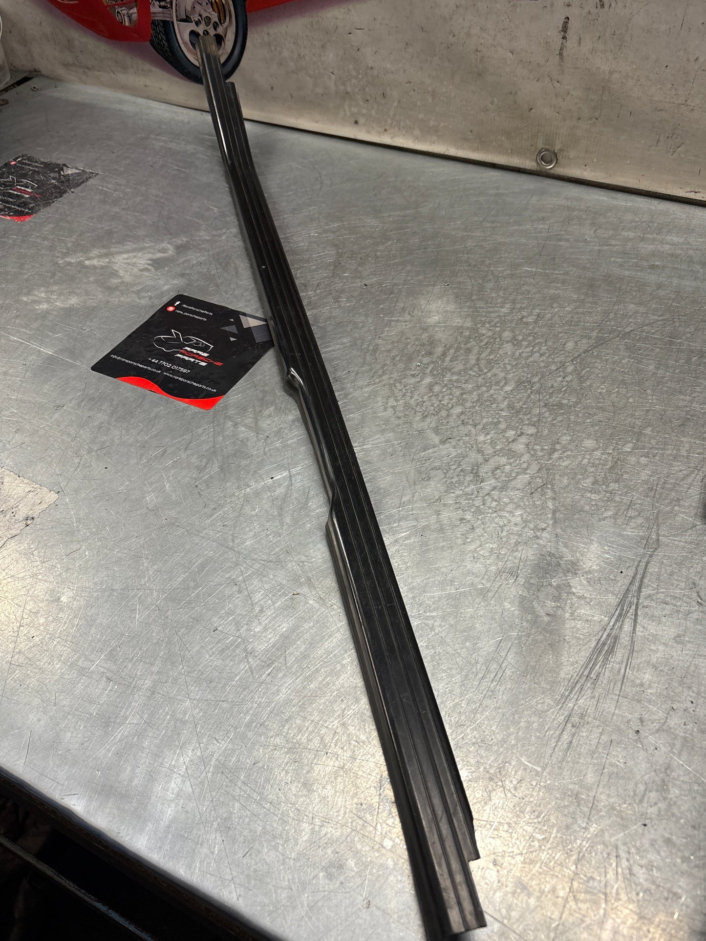 Porsche 944 85.5- left sill trim, scuff plate used 94455112100 cracked