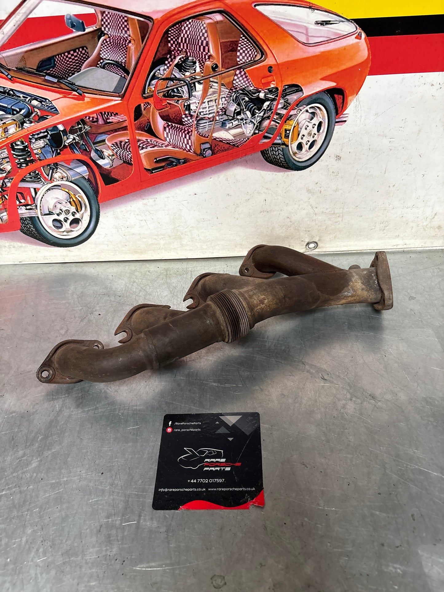 Porsche 928 exhaust manifold, left 92811114505, used