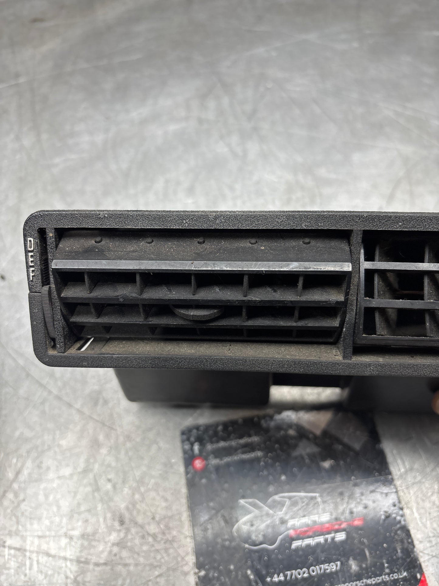 Porsche 924/944 DEF used interior air vent Black 477819151 spares or repair