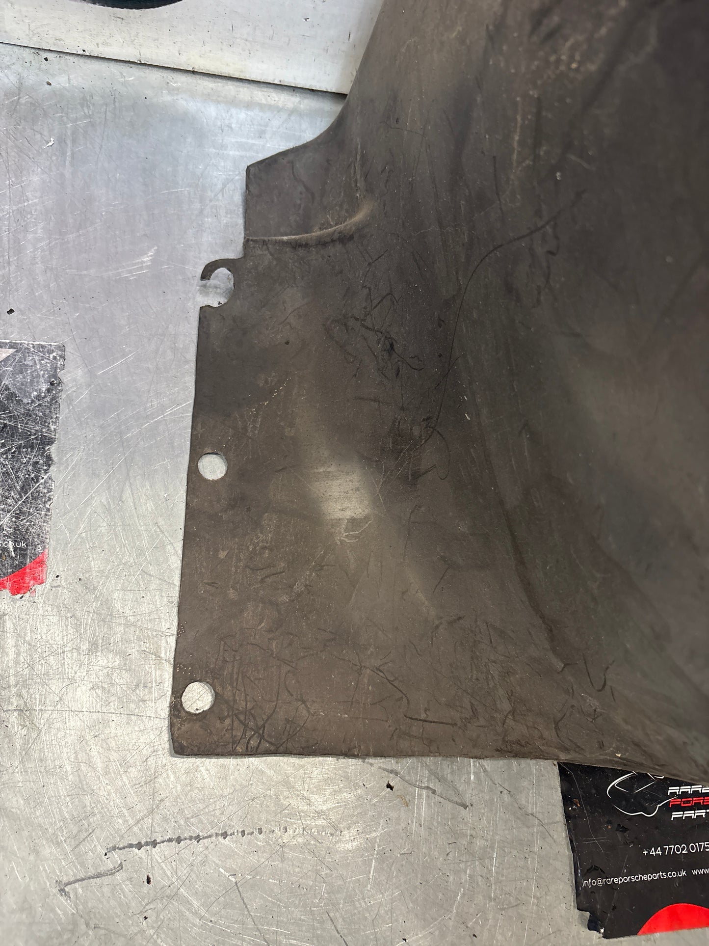 Porsche 944 from 85.5 wheel arch liner  Left, 94450438101 Used