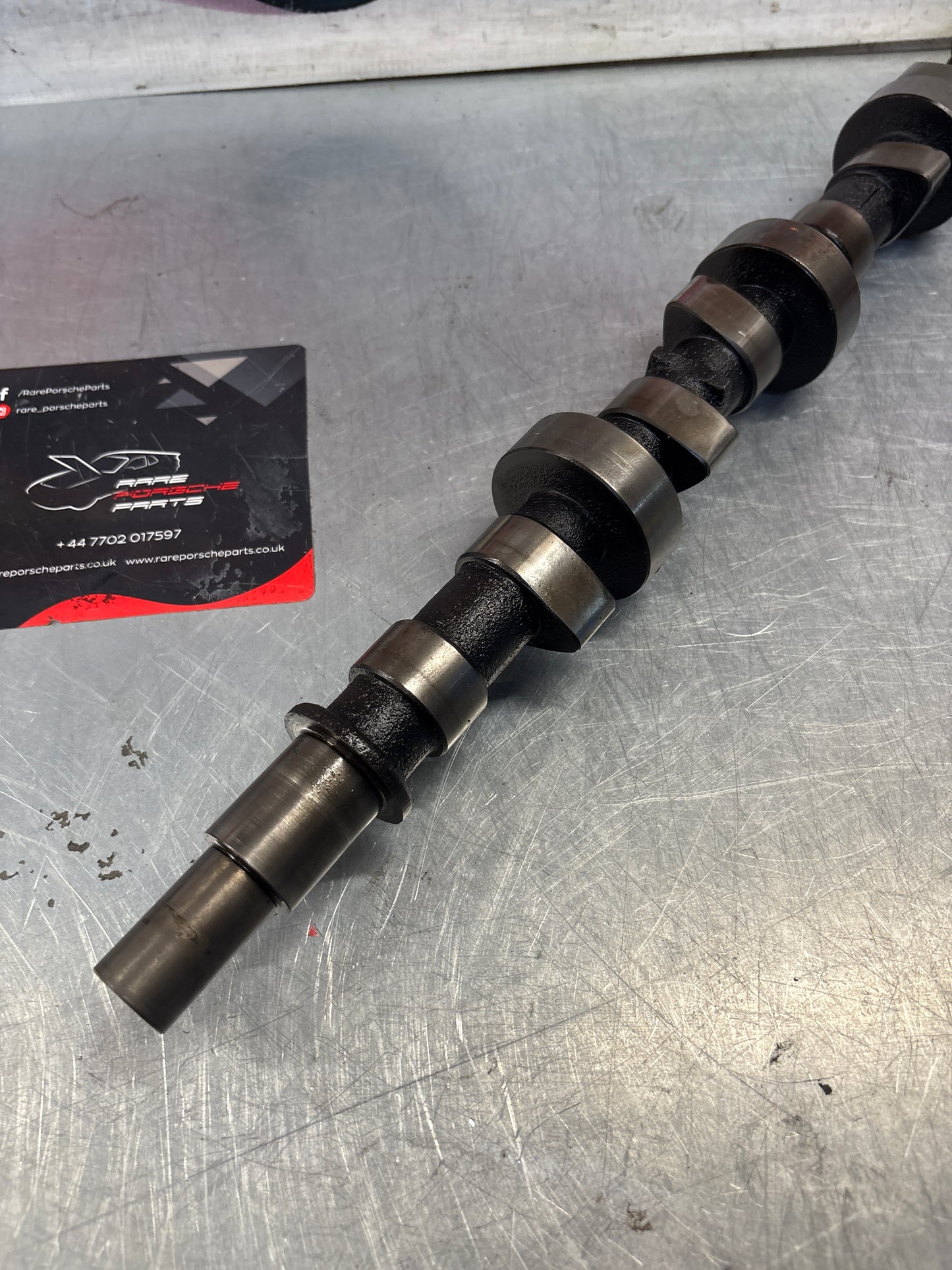 Porsche 928 cam shaft, used 9281051553R