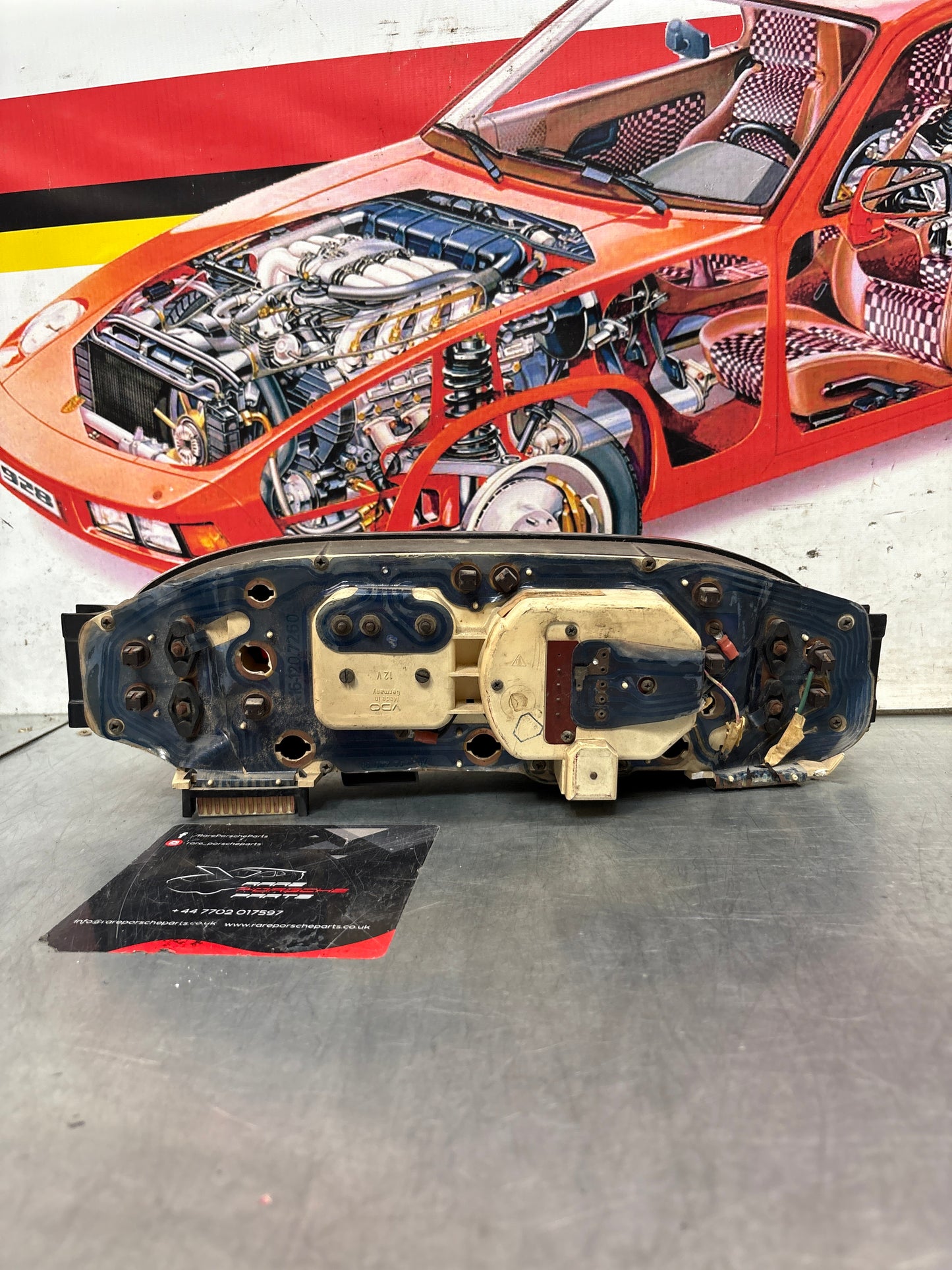Porsche 928 dash clock binnacle pod speedometer, 92864110130 used  showing 105281 Km, plastic screen has some scratches