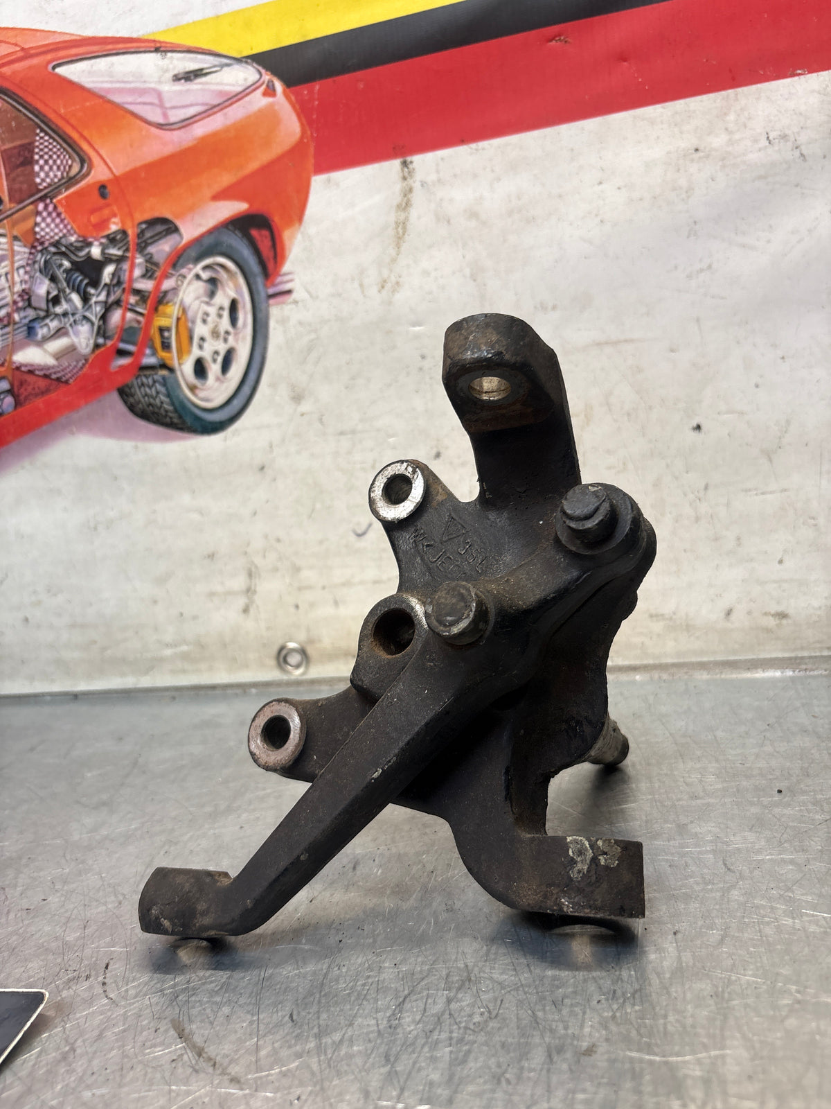 Porsche 928 left steering spindle knuckle, used 92834105713