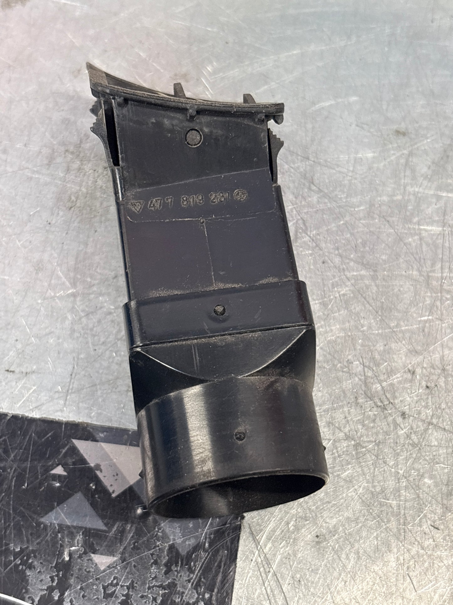 Porsche 924/944 Black dash air vent. left hand, with connecting piece 477819231 / 477819717 used