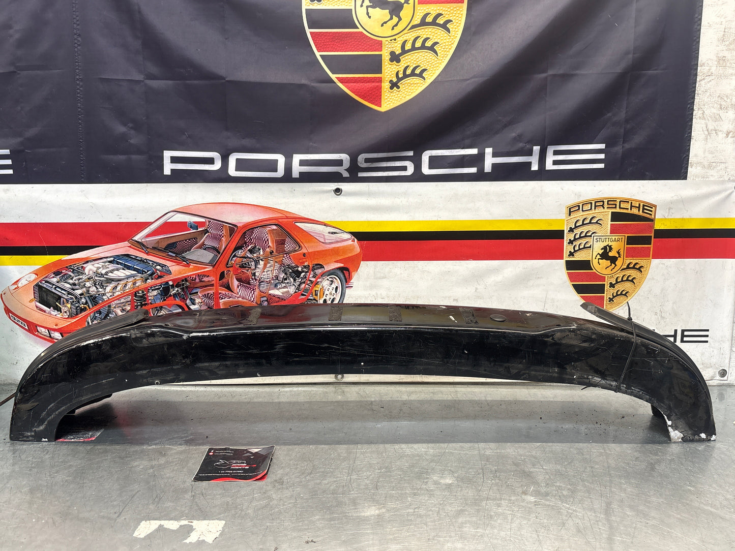 Porsche 911 930 rear bumper with skirt, used 93050511201