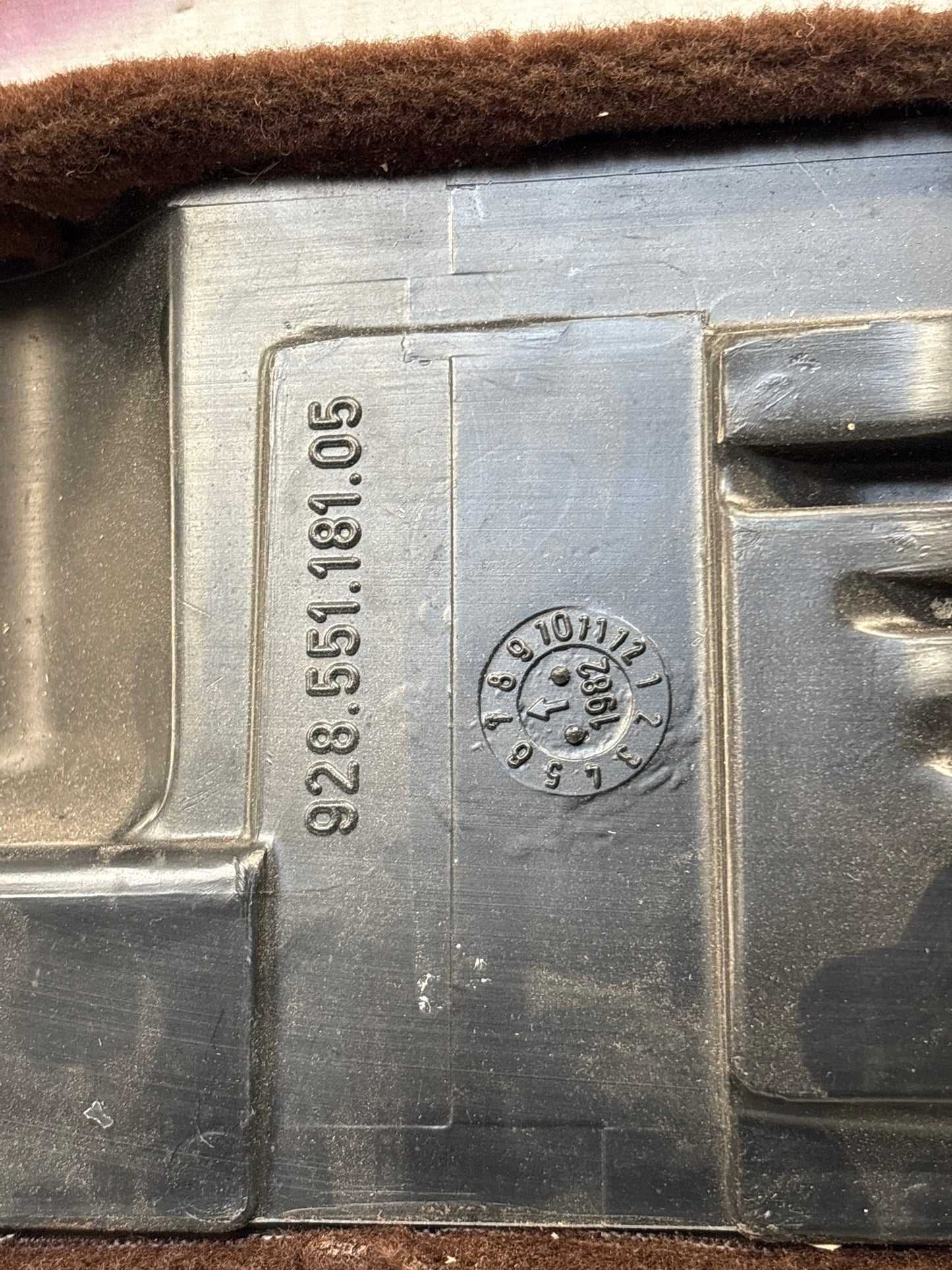 Porsche 928 brown carpeted Tool kit panel cover, used 92855118105