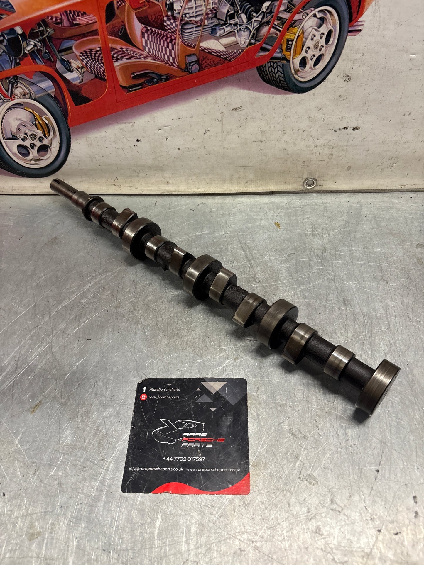 Porsche 928 cam shaft, used 9281051870R
