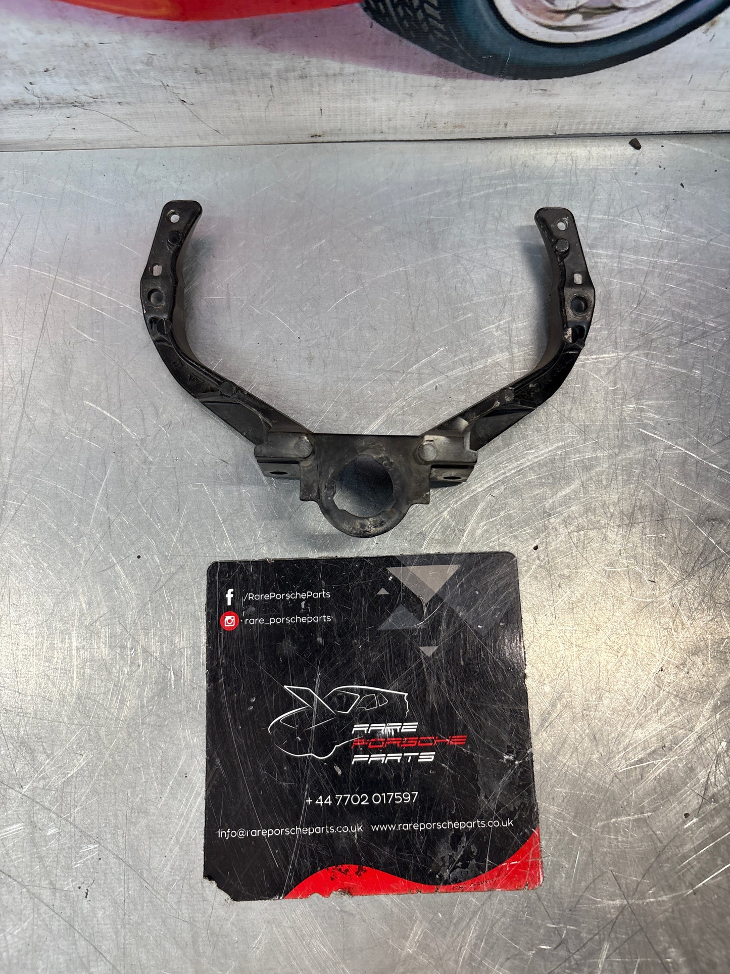 Porsche 928 headlight support arm, used 92875028502