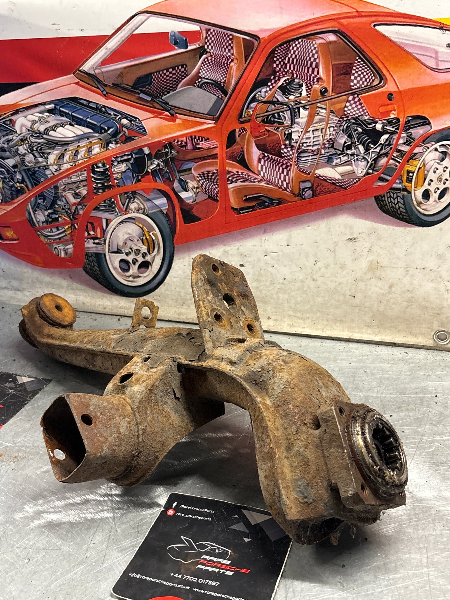 Porsche 924 944  -85.5 Rear left trailing arm, used 94433102100