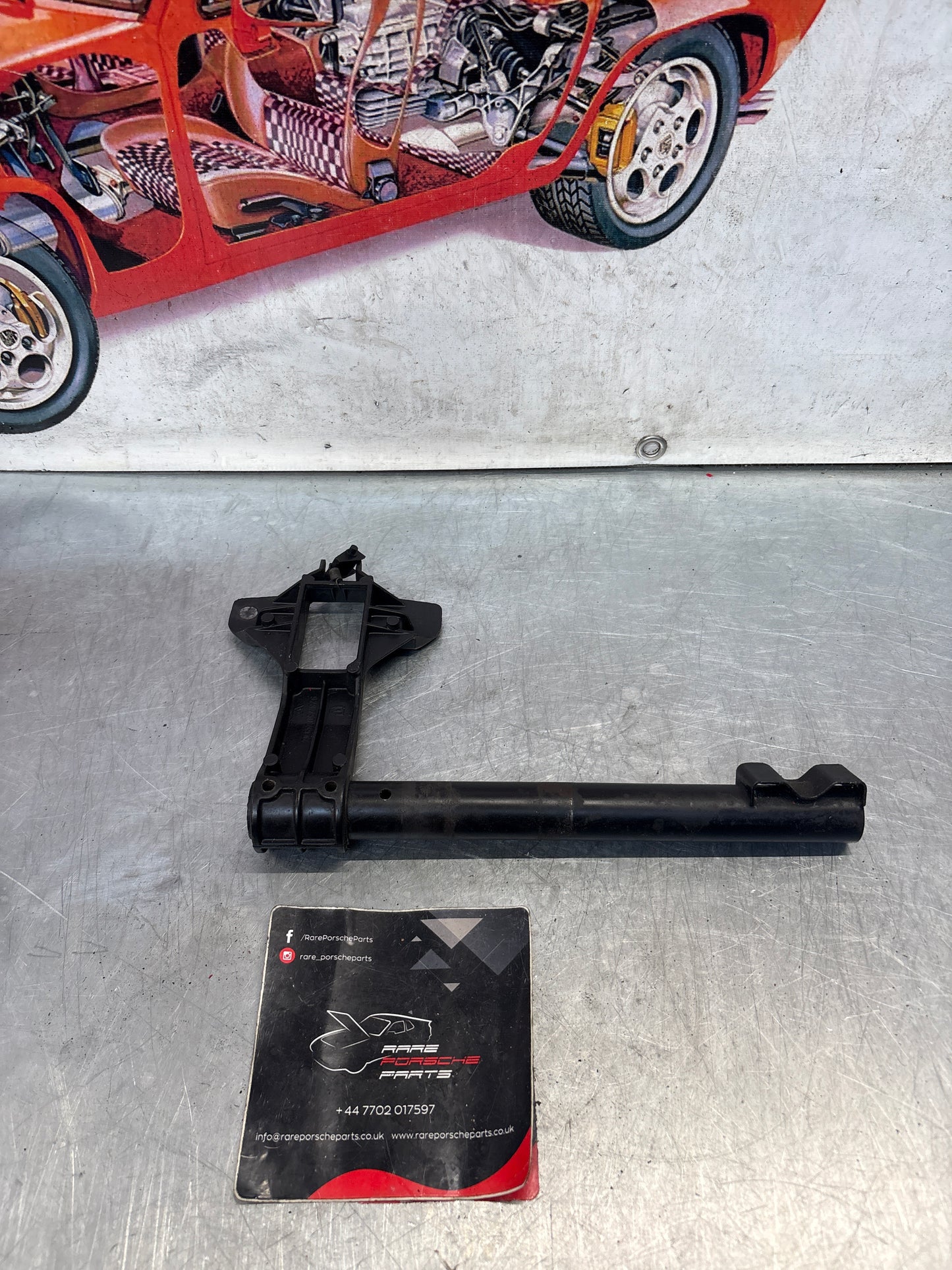 Porsche 928 headlight swivel driving arm, used 92875009805 / 92875024902