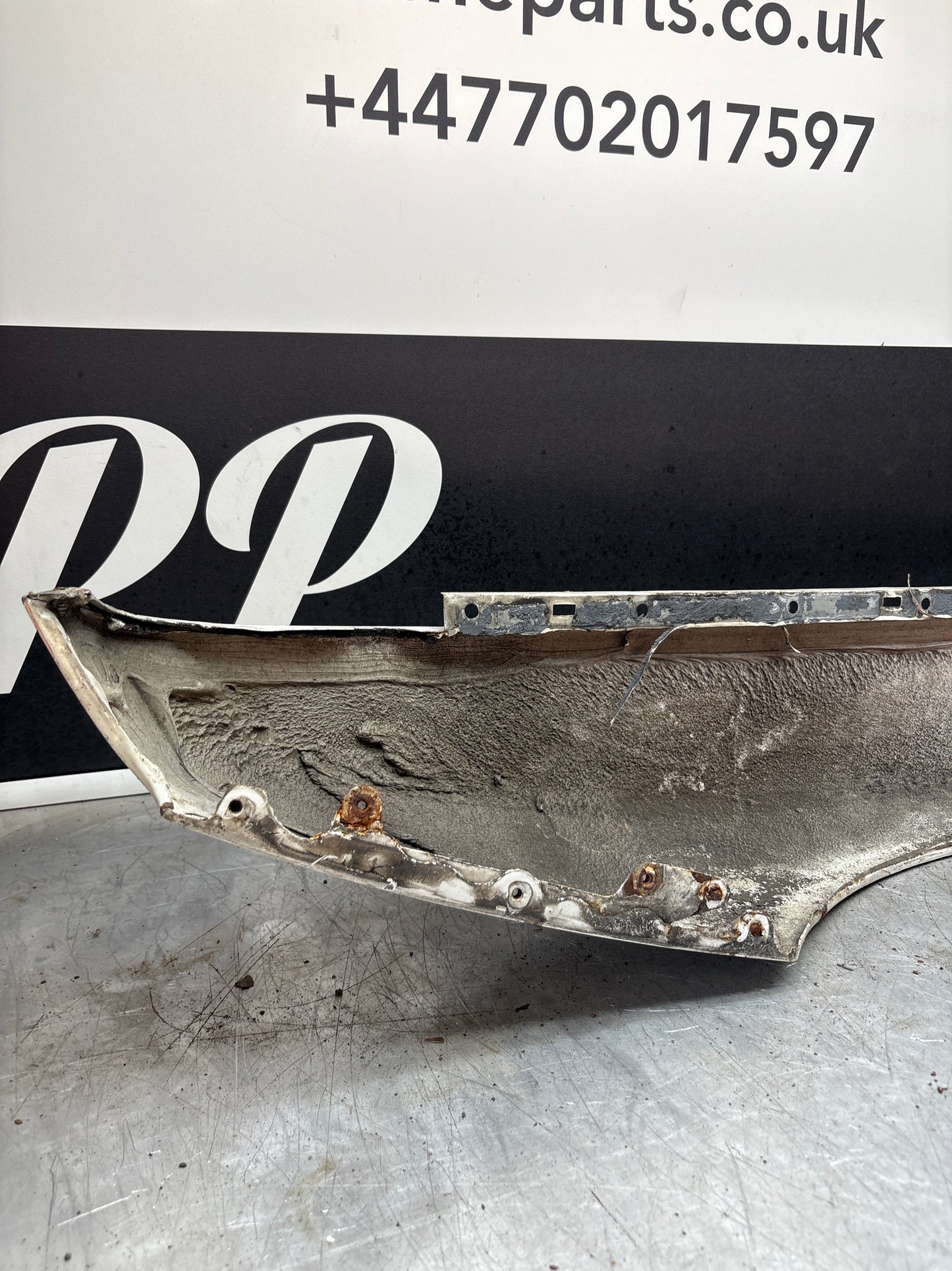 Porsche 944, early front right wing, in need of repair