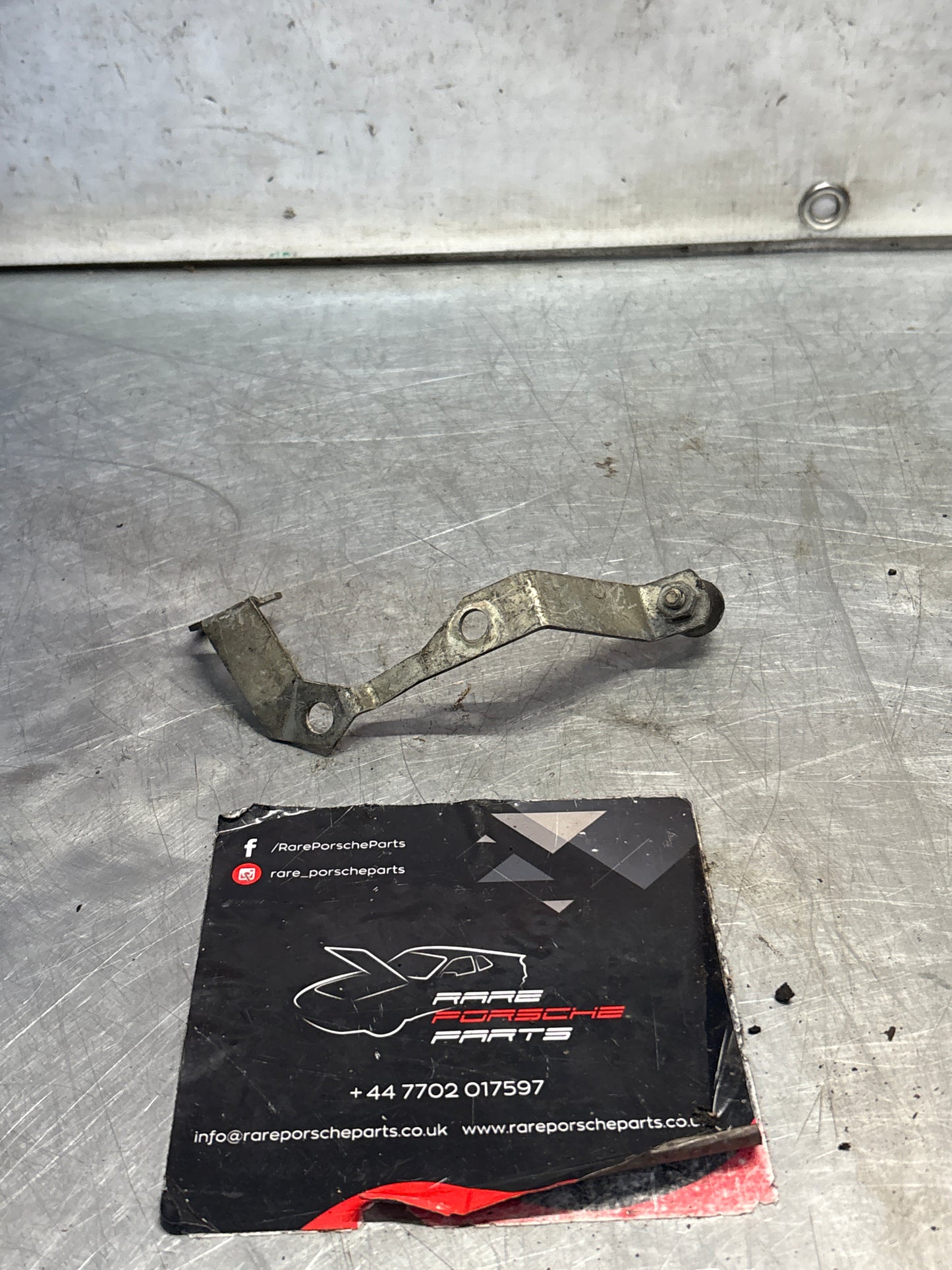 Porsche 928 air cleaner support, used 92811052506