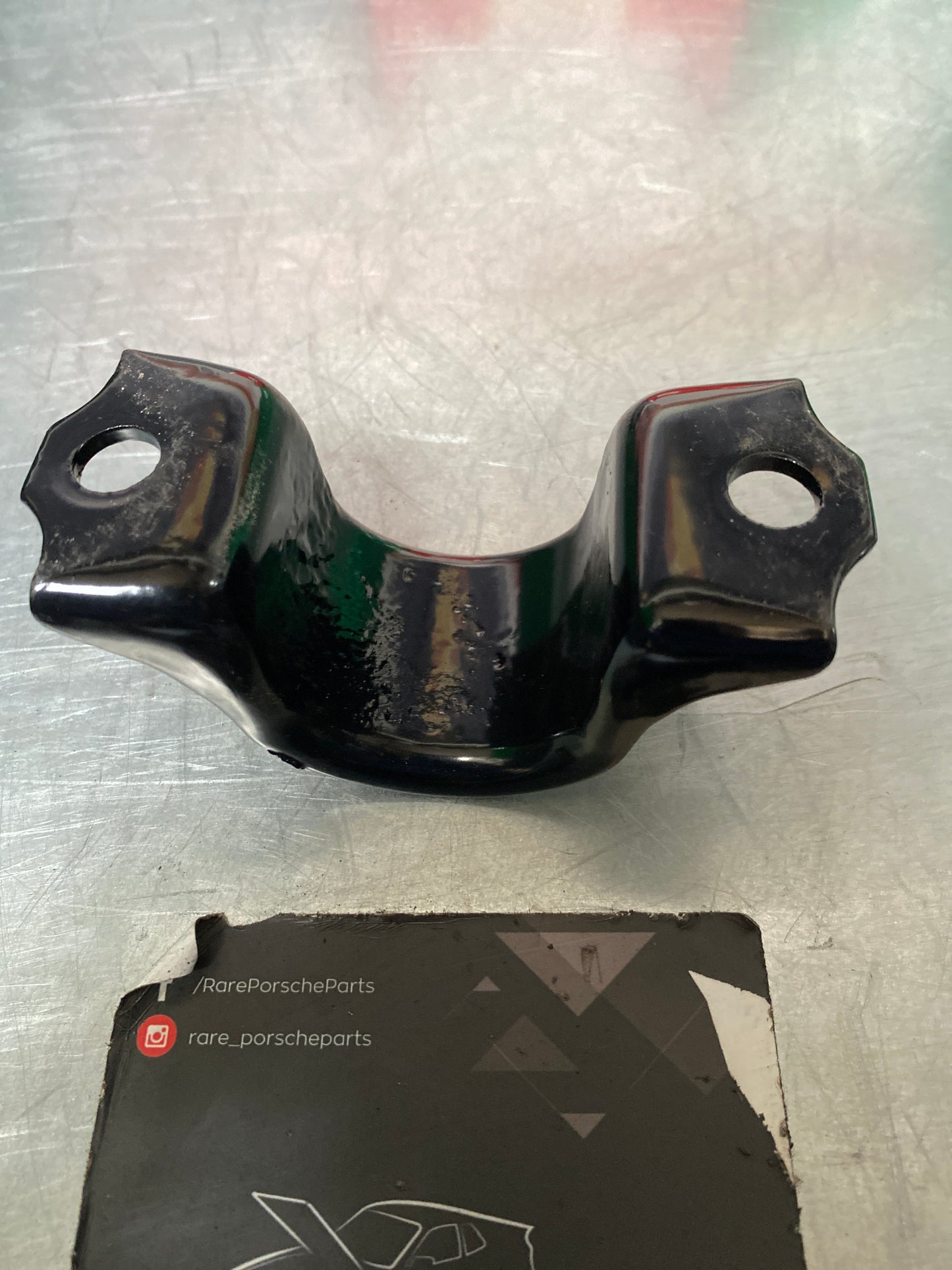 Porsche 928 front anti roll bar clamp, 92834377700 used