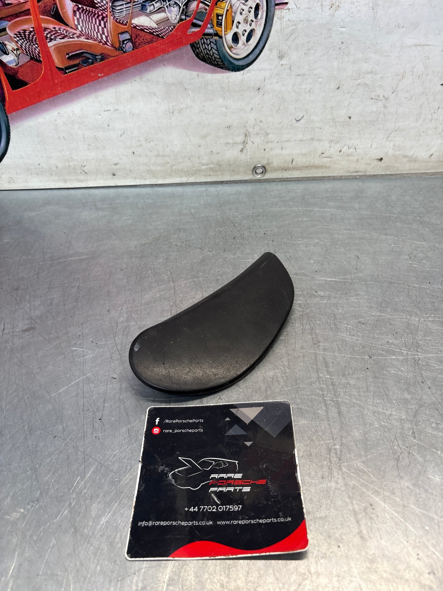 Porsche 928 seat hinge cover black used,cracked 92852114802