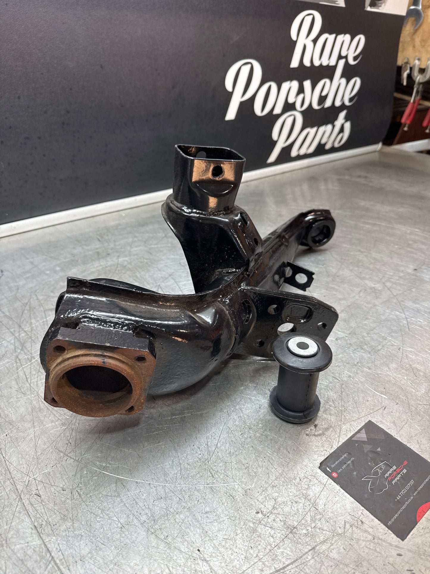 Porsche 924 944  -85.5 Rear left trailing arm, refurbished 94433102100