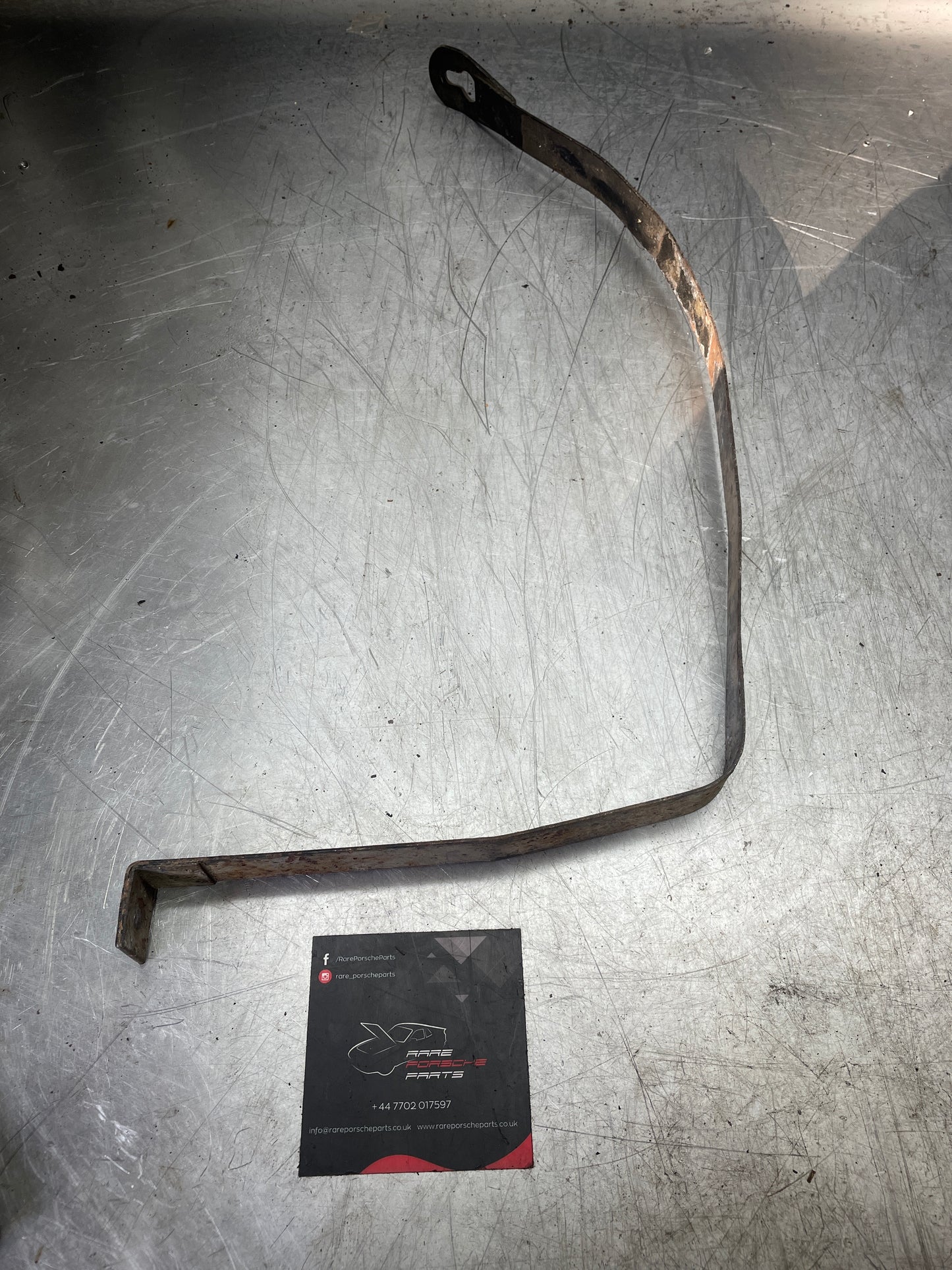 Porsche 944 90- fuel tank restraining strap, right used 95120131202 aftermarket, stainless steel