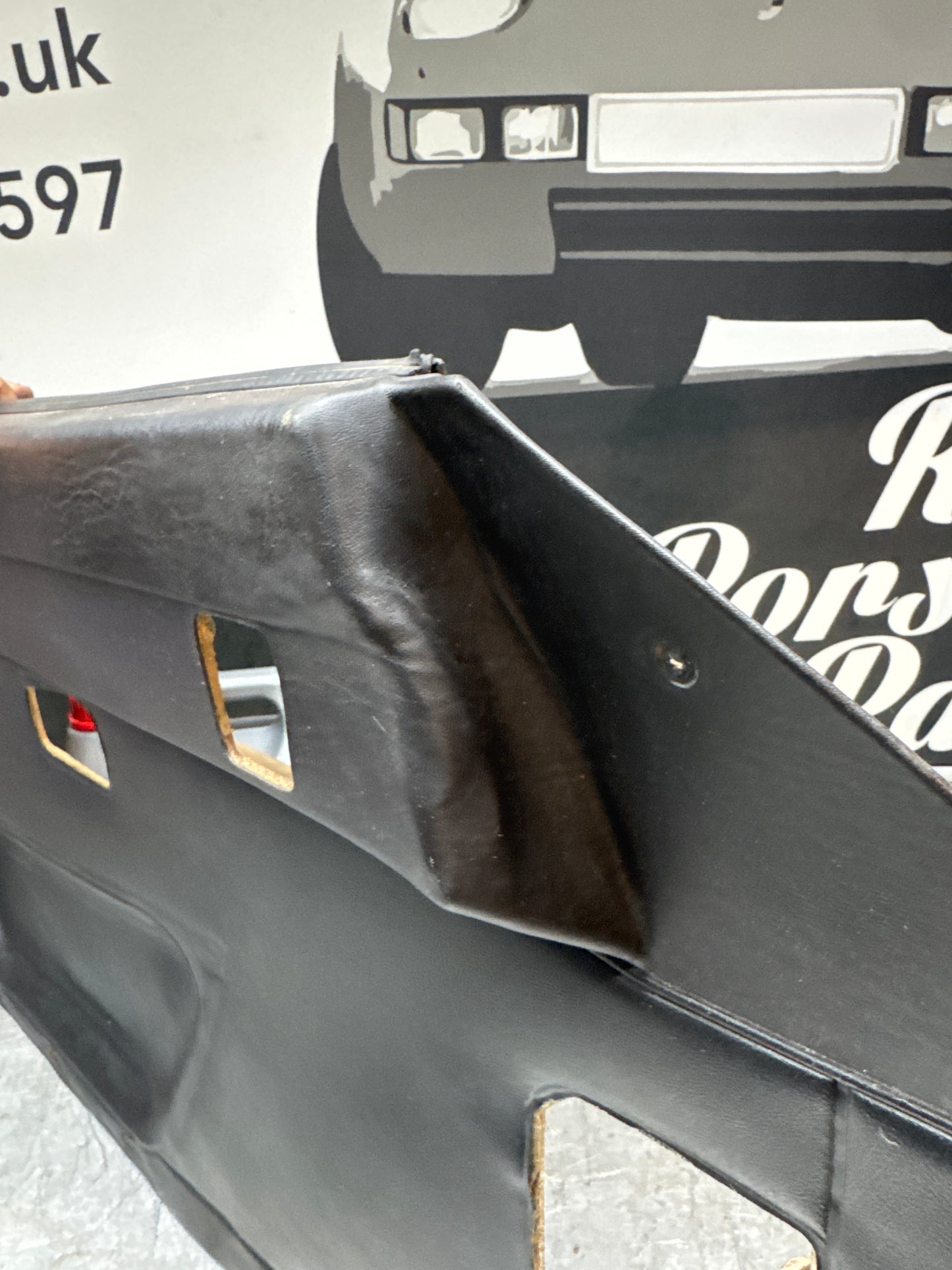 Porsche 924/ Early 944 black RHD Left door card. Fibreglass repaired. 477867012