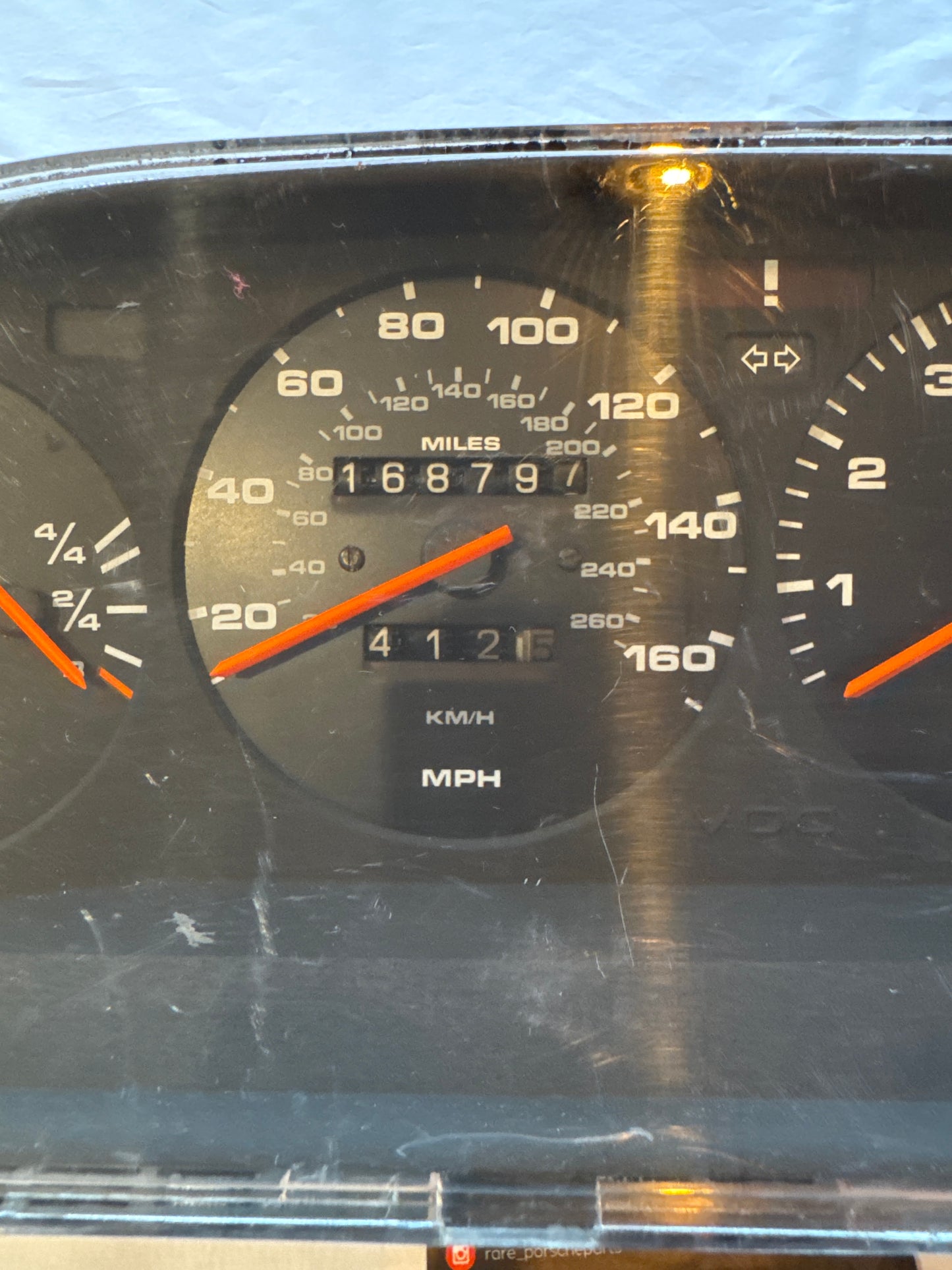 Porsche 944 dash clock binnacle pod speedometer, 94564131102 used 168797 miles, scratched screen