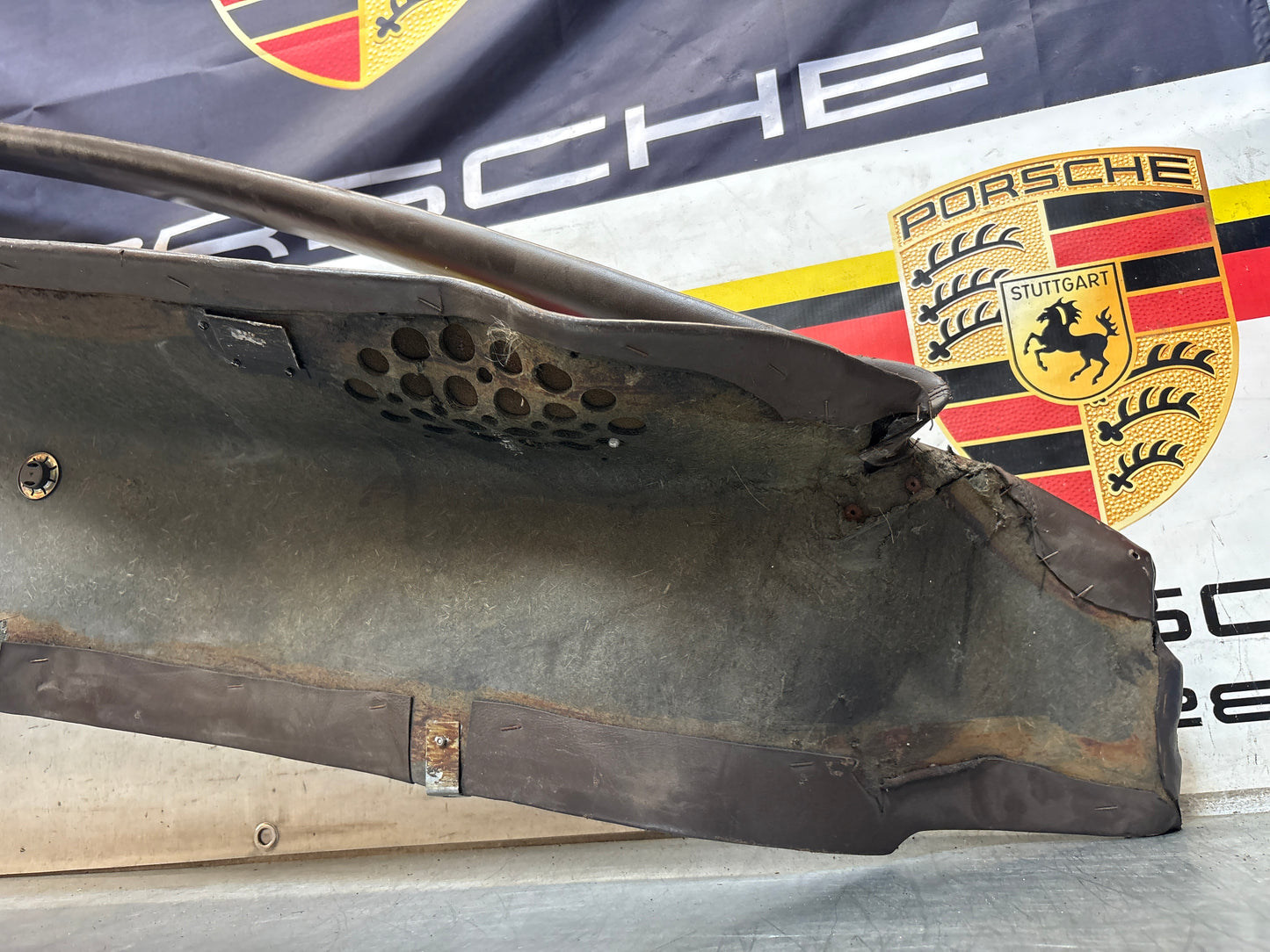Porsche 928 early left side lower side trim panel, without loudspeaker, brown used 92855502102