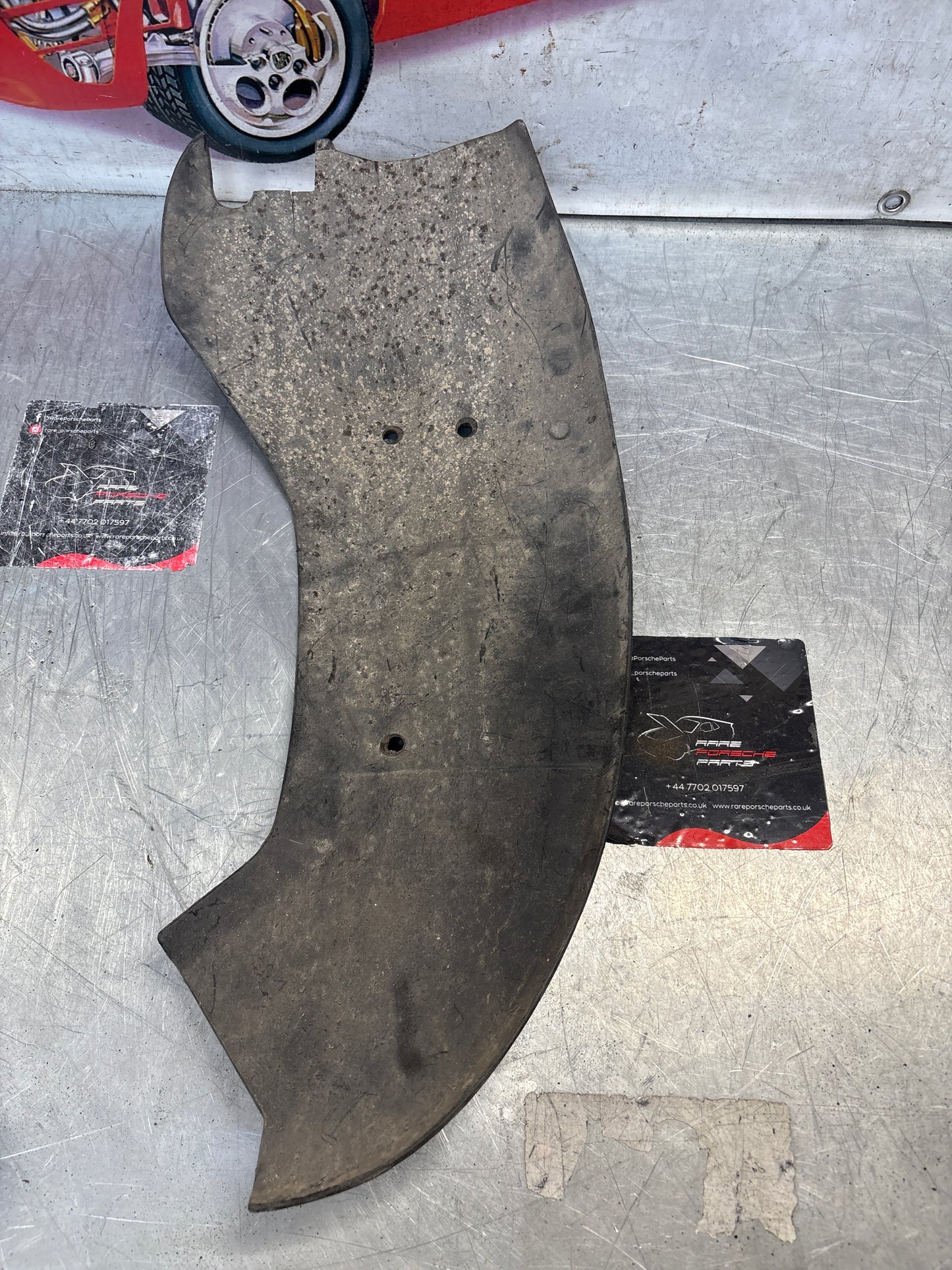 Porsche 928 rear right fender wheel cover, used 92850430402