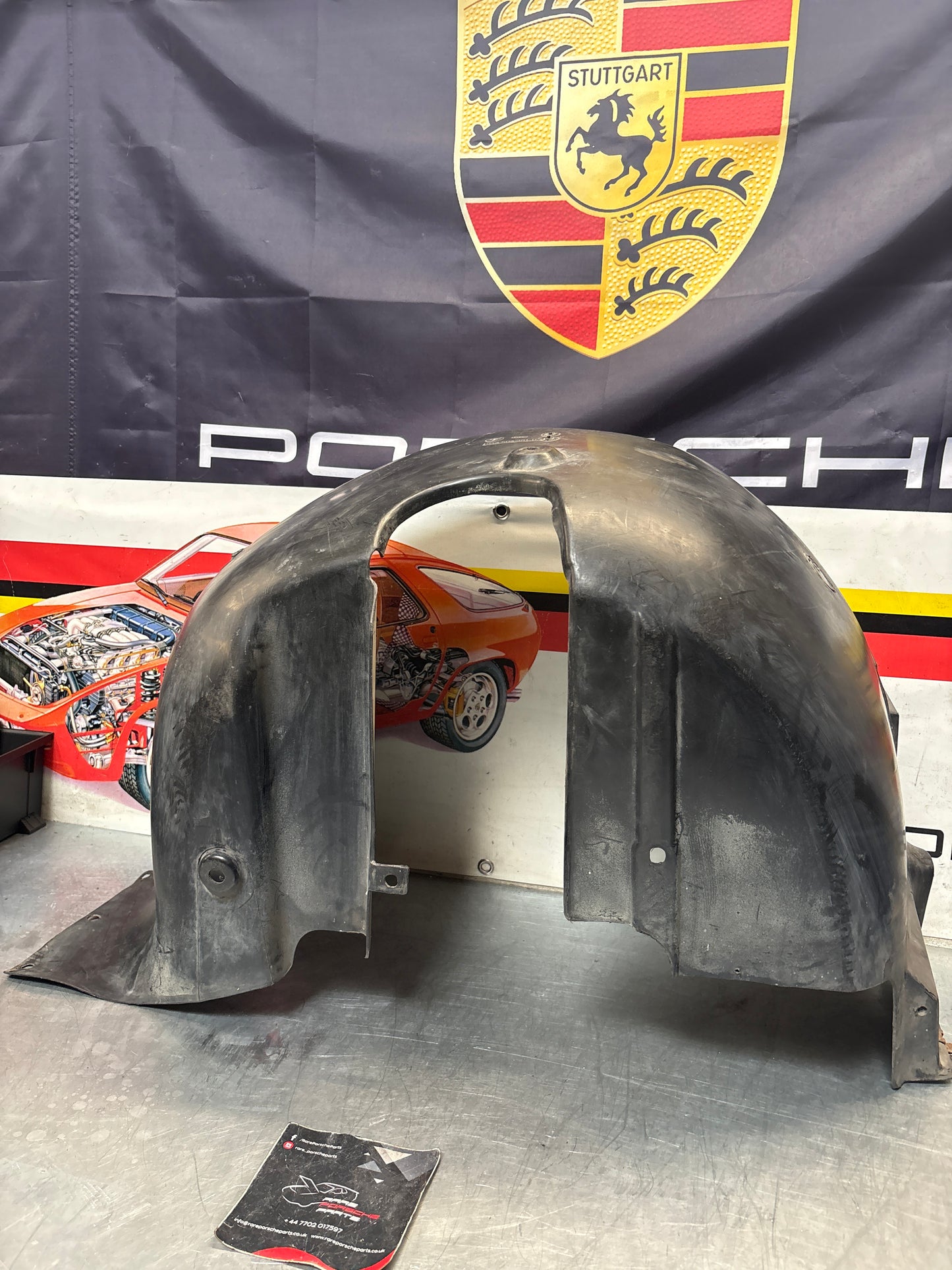 Porsche 944 from 85.5 wheel arch liner  Left, 94450438101 Used