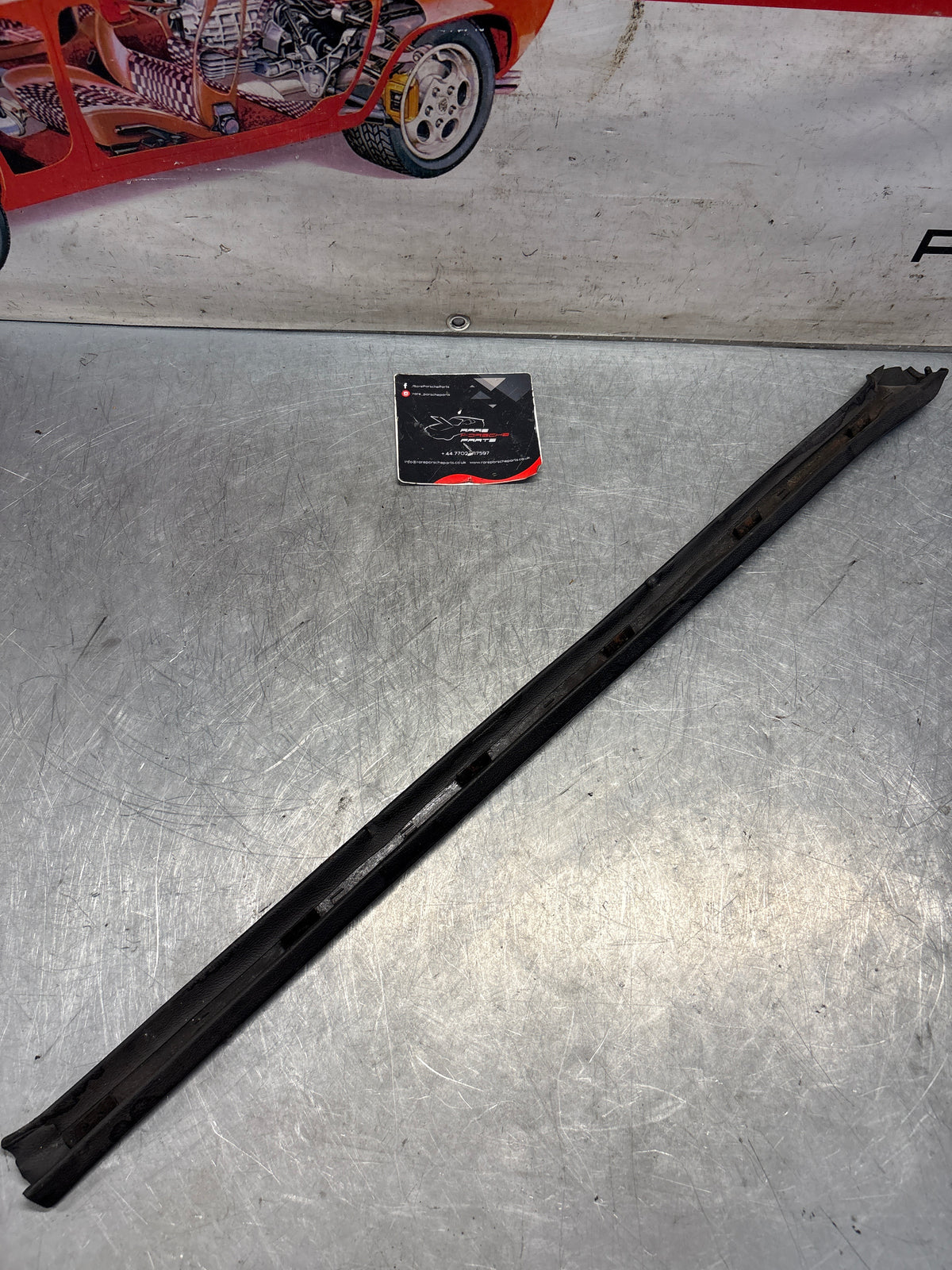 Porsche 928 tailgate trim, left, near side, black, 92855503702, used