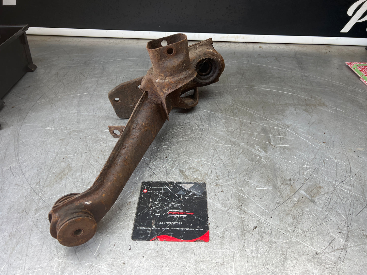Porsche 924 944  -85.5 Rear left trailing arm, 94433102100