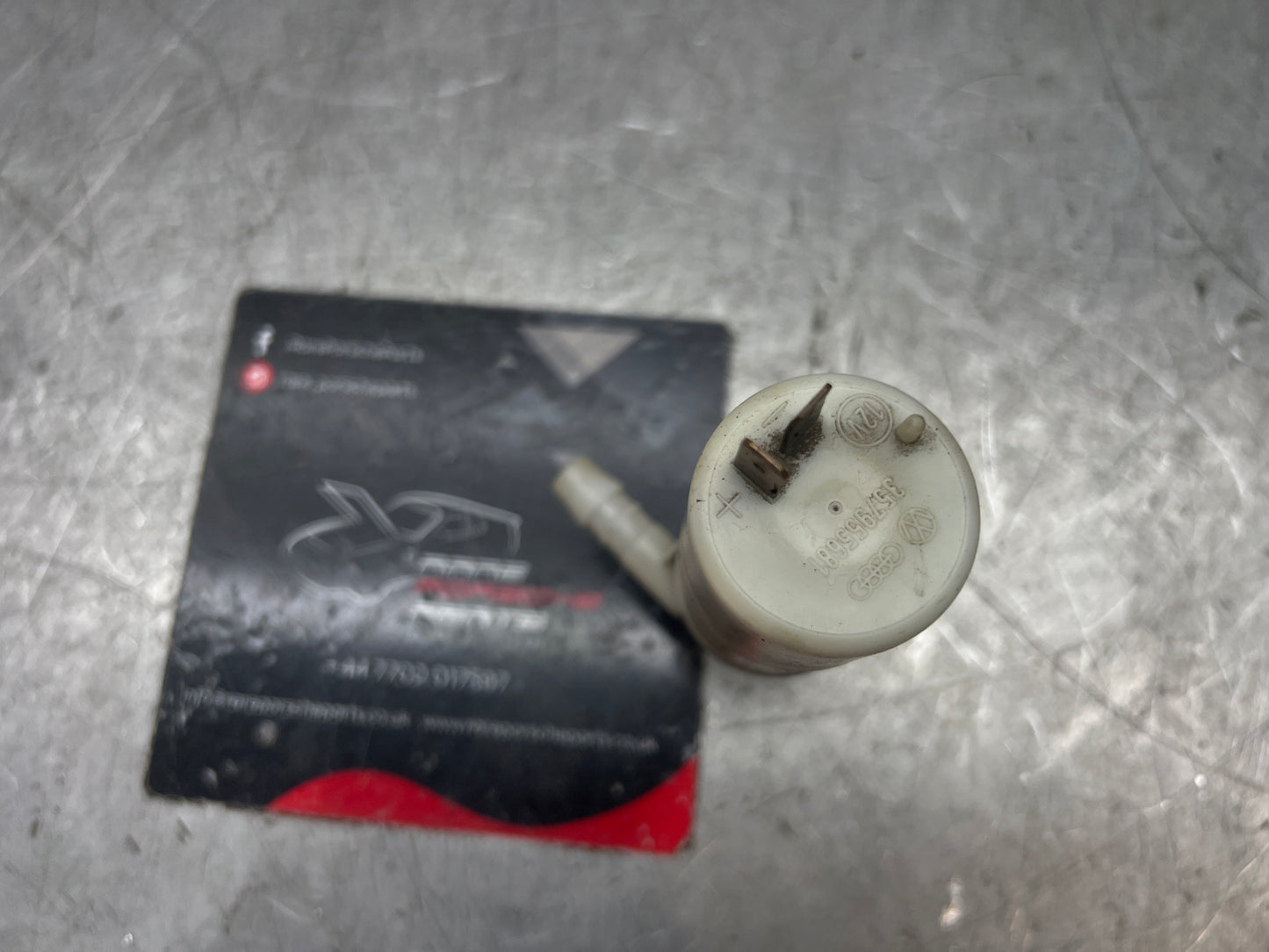 Porsche 924/944 Windscreen water bottle pump (used genuine) 357955681