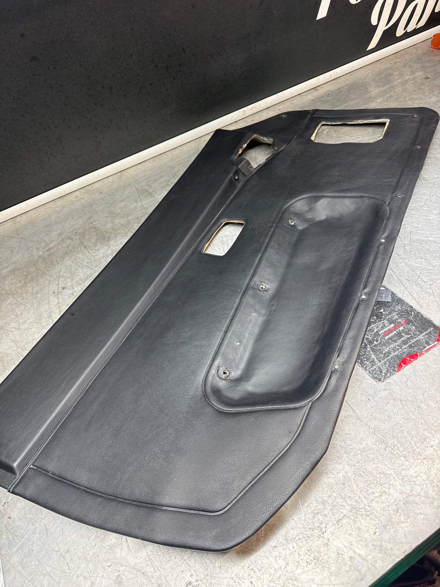 Porsche 944 left black door card for late cars from 85.5. Fibreglass repair.