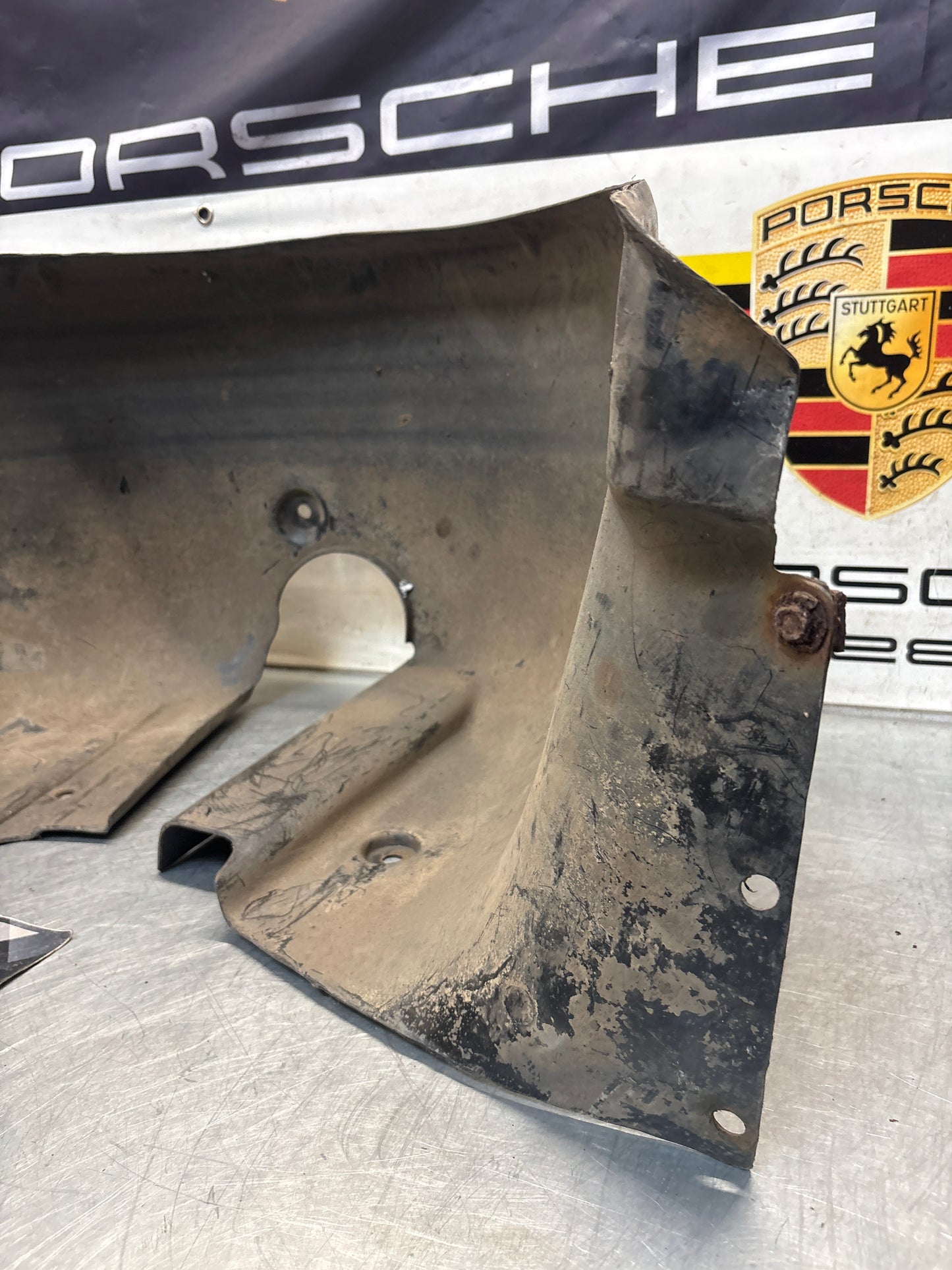 Porsche 944 from 85.5 wheel arch liner  Left, 94450438101 Used