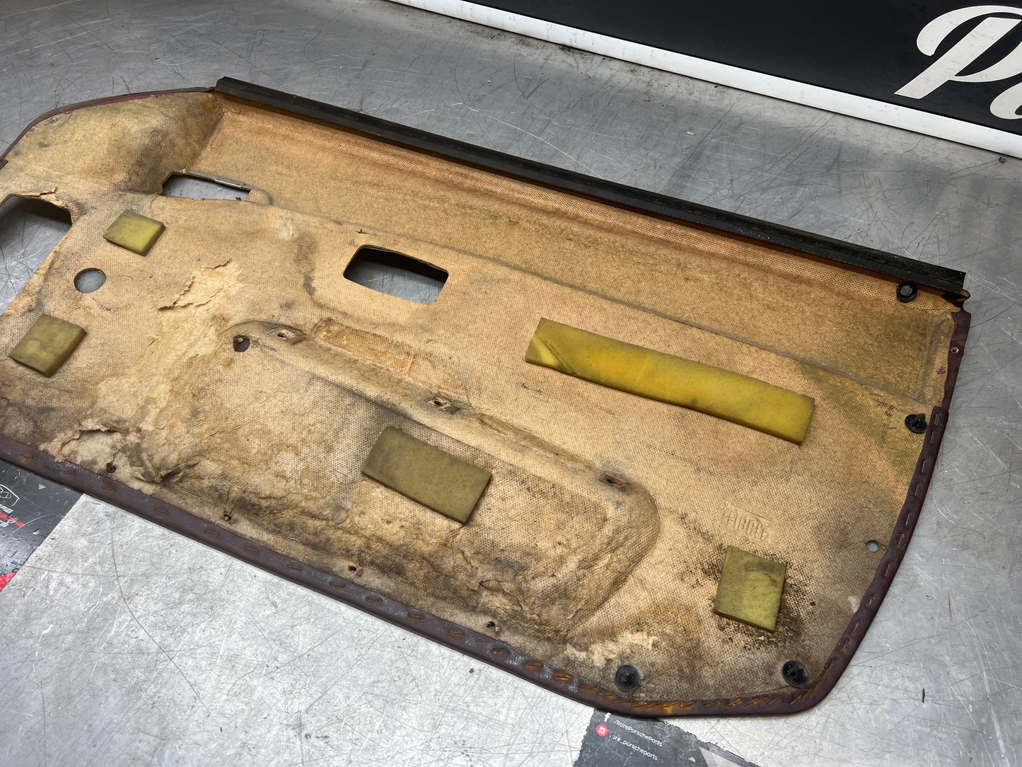 Porsche 944 left burgundy  door card for late cars from 85.5 944555017