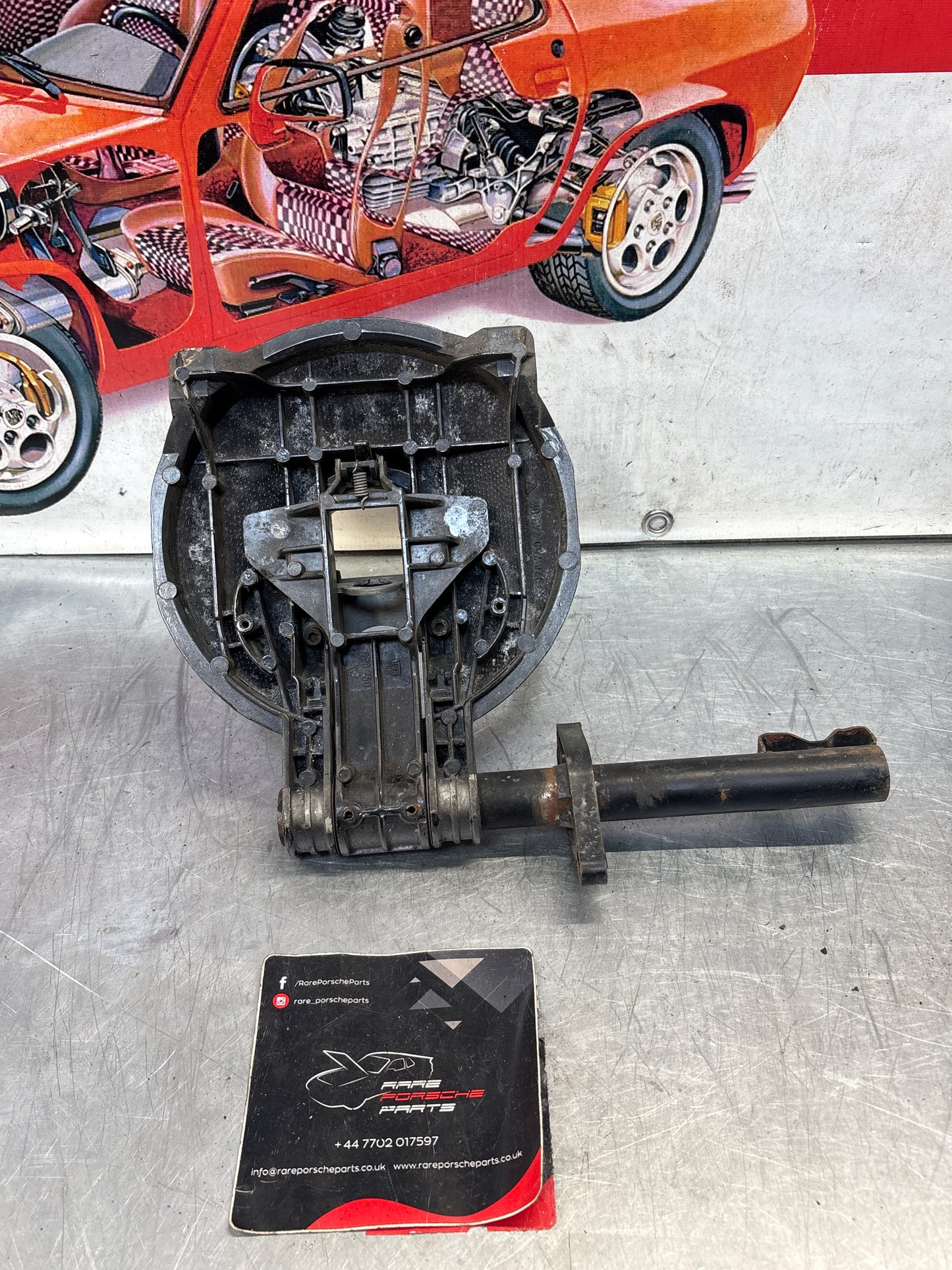 Porsche 928 right headlight swivel frame 92875024902 92875024302 used