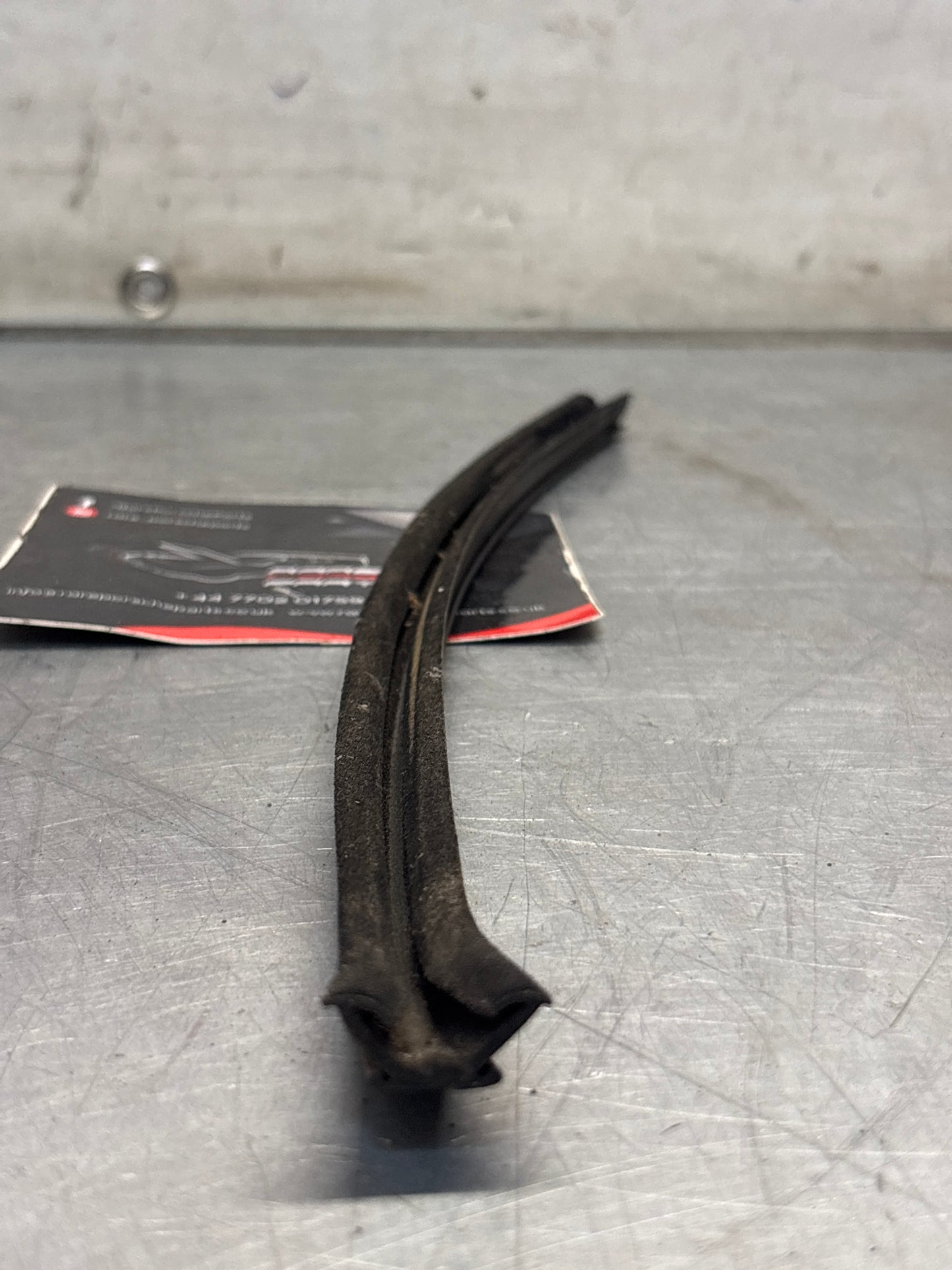 Porsche 924 / 944 window guide seal, used 477837385