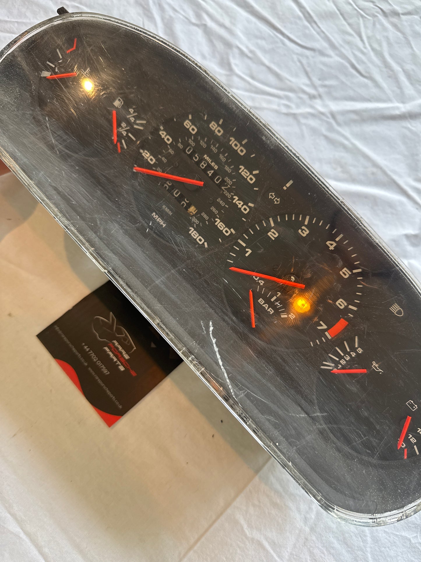 Porsche 944 Turbo dash clock binnacle pod speedometer, 951641311 used 058402 miles plastic screen has some small scratches