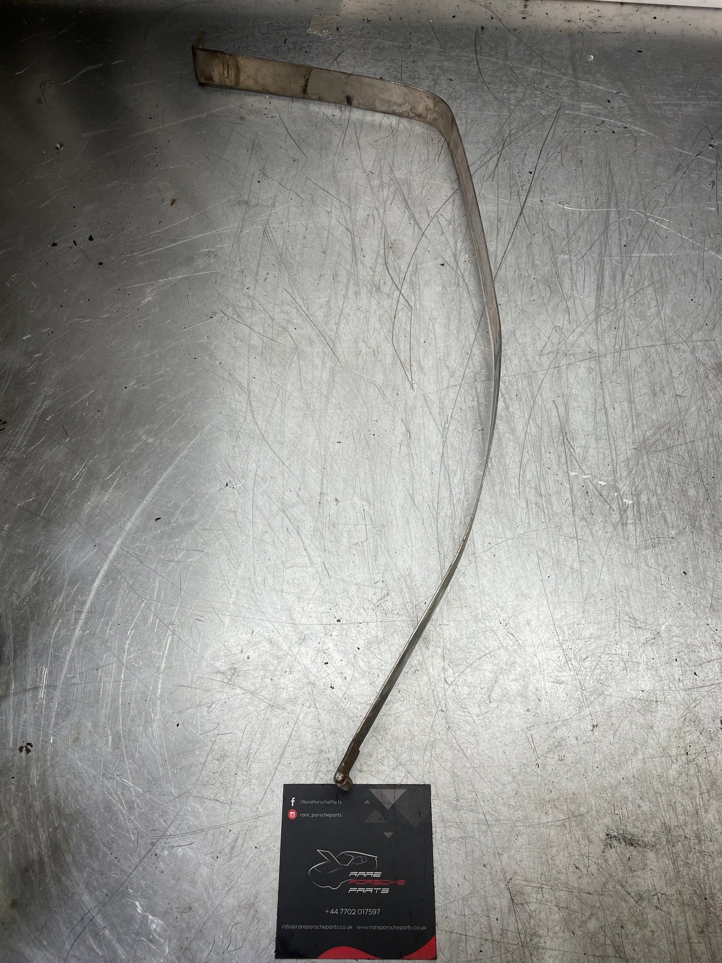 Porsche 944 fuel tank restraining strap, right used 95120131201 aftermarket, stainless steel