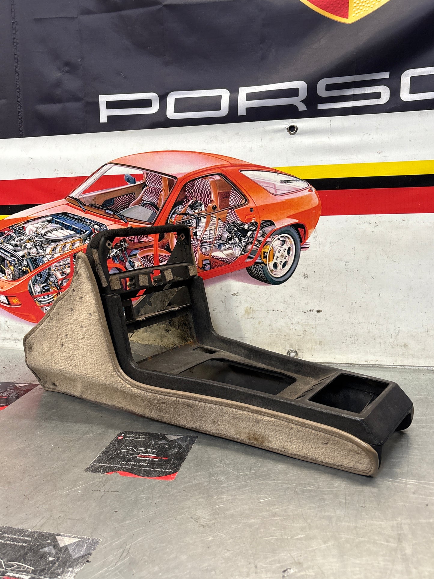 Porsche 924 centre console black, with one switch hole 477857951 / 477857969 used, with cream carpet, used