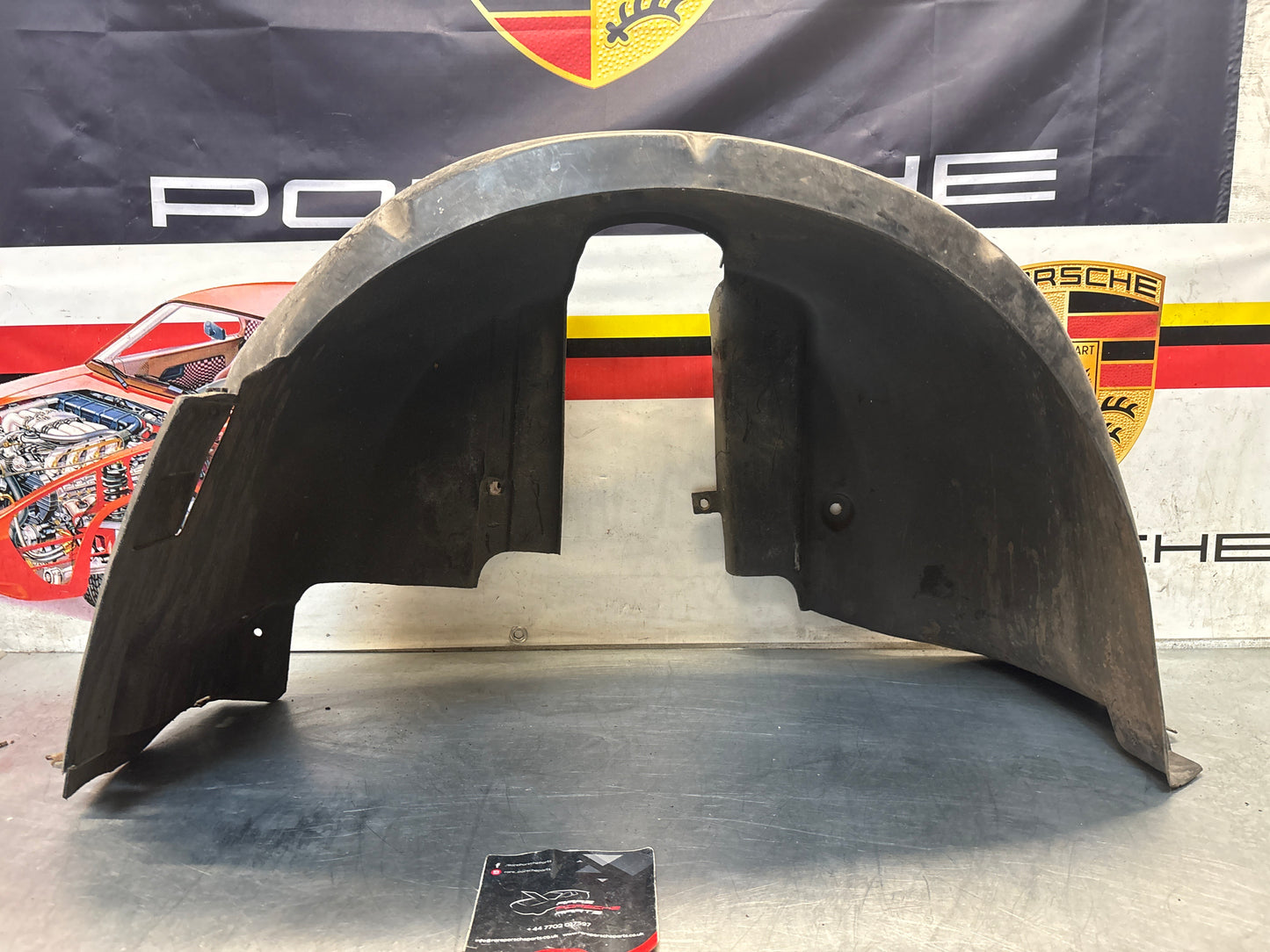 Porsche 944 from 85.5 wheel arch liner  Left, 94450438101 Used