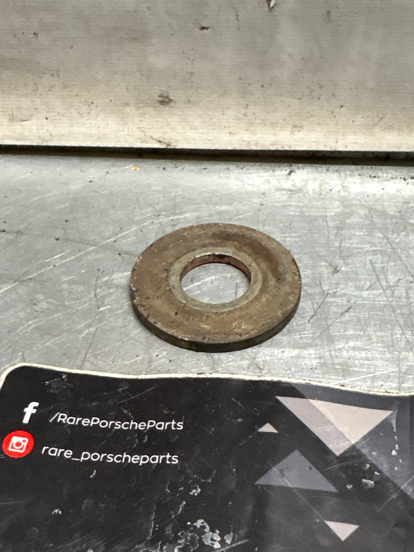 Porsche 928 wishbone bearing pin plate, used 92833164702