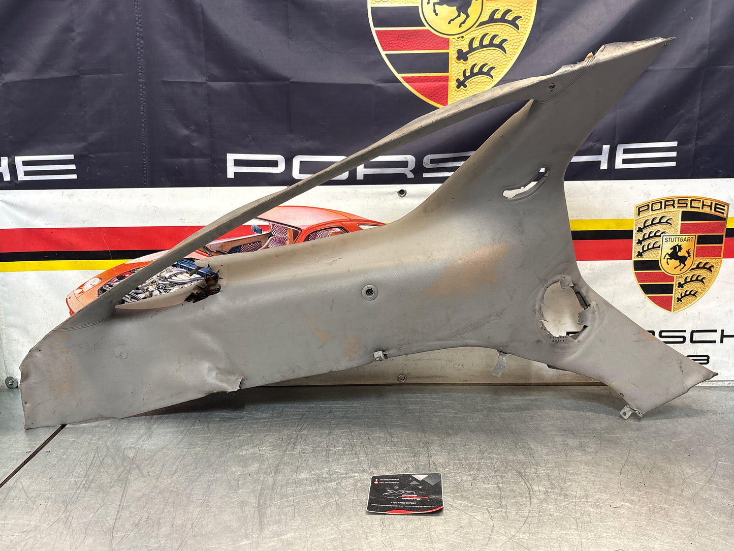 Porsche 928 left side lower side trim panel, grey used 92855502157