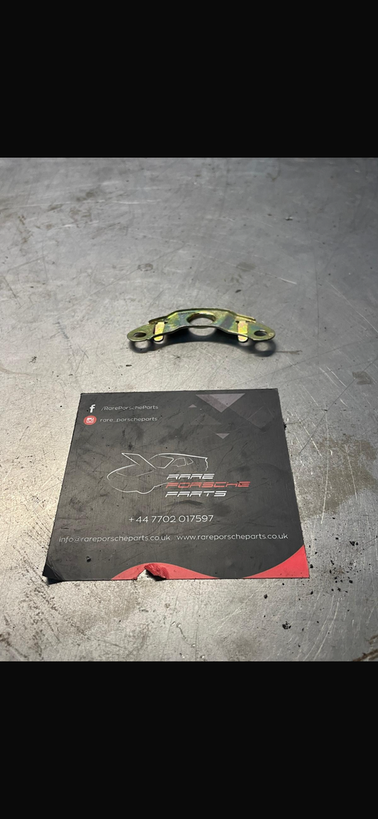 Porsche 928 cable guide plate, refurbished 92835282300