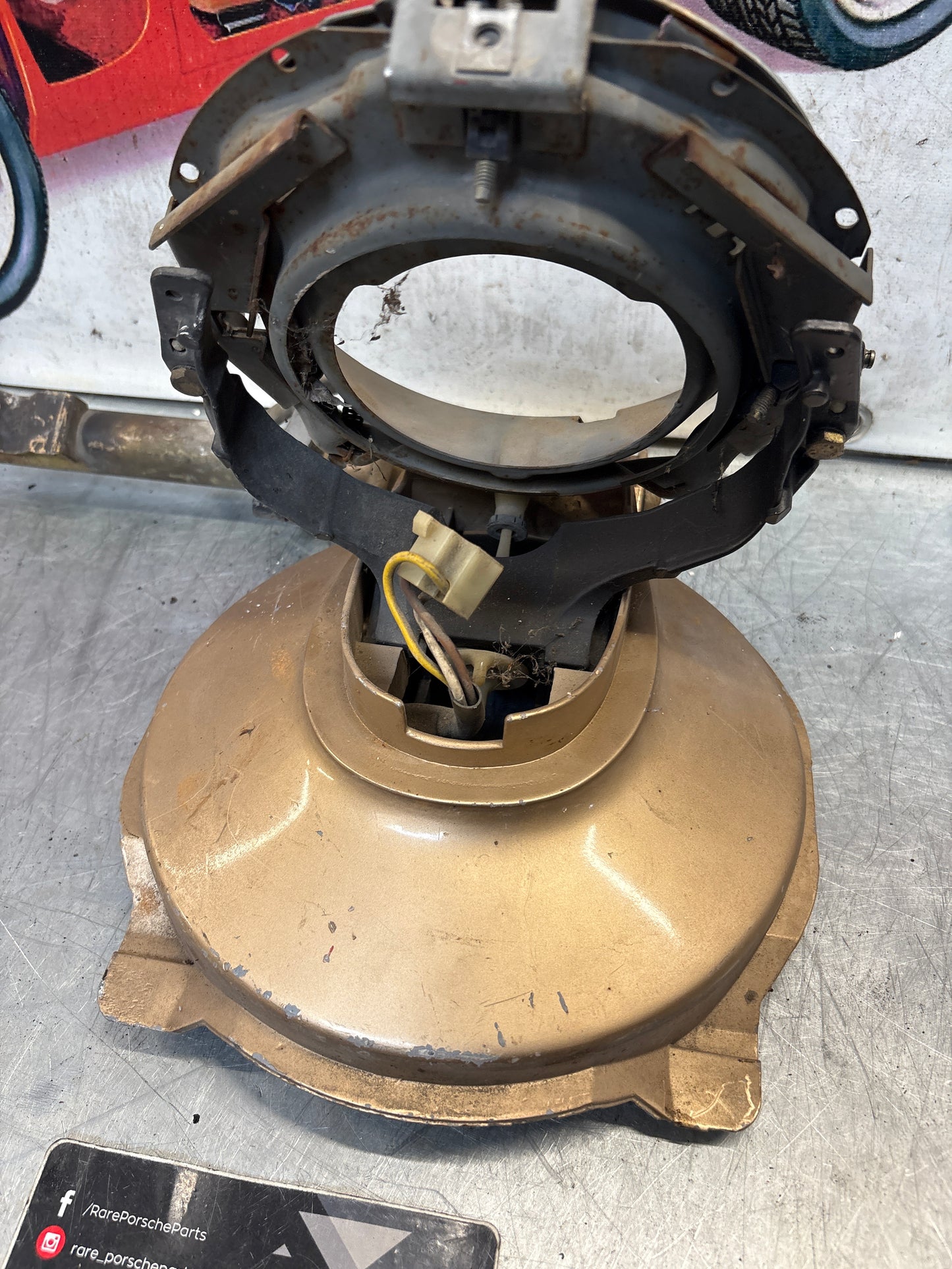 Porsche 928 left headlight swivel frame 92875024902 92875024302 used