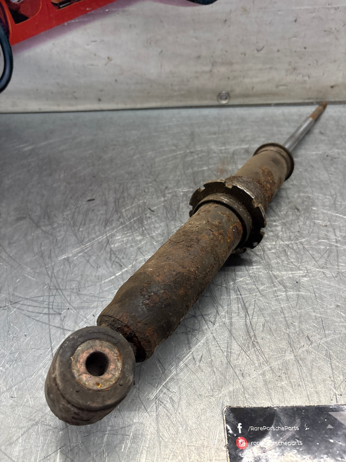Porsche 911 964 rear shock absorber, used 96433305700