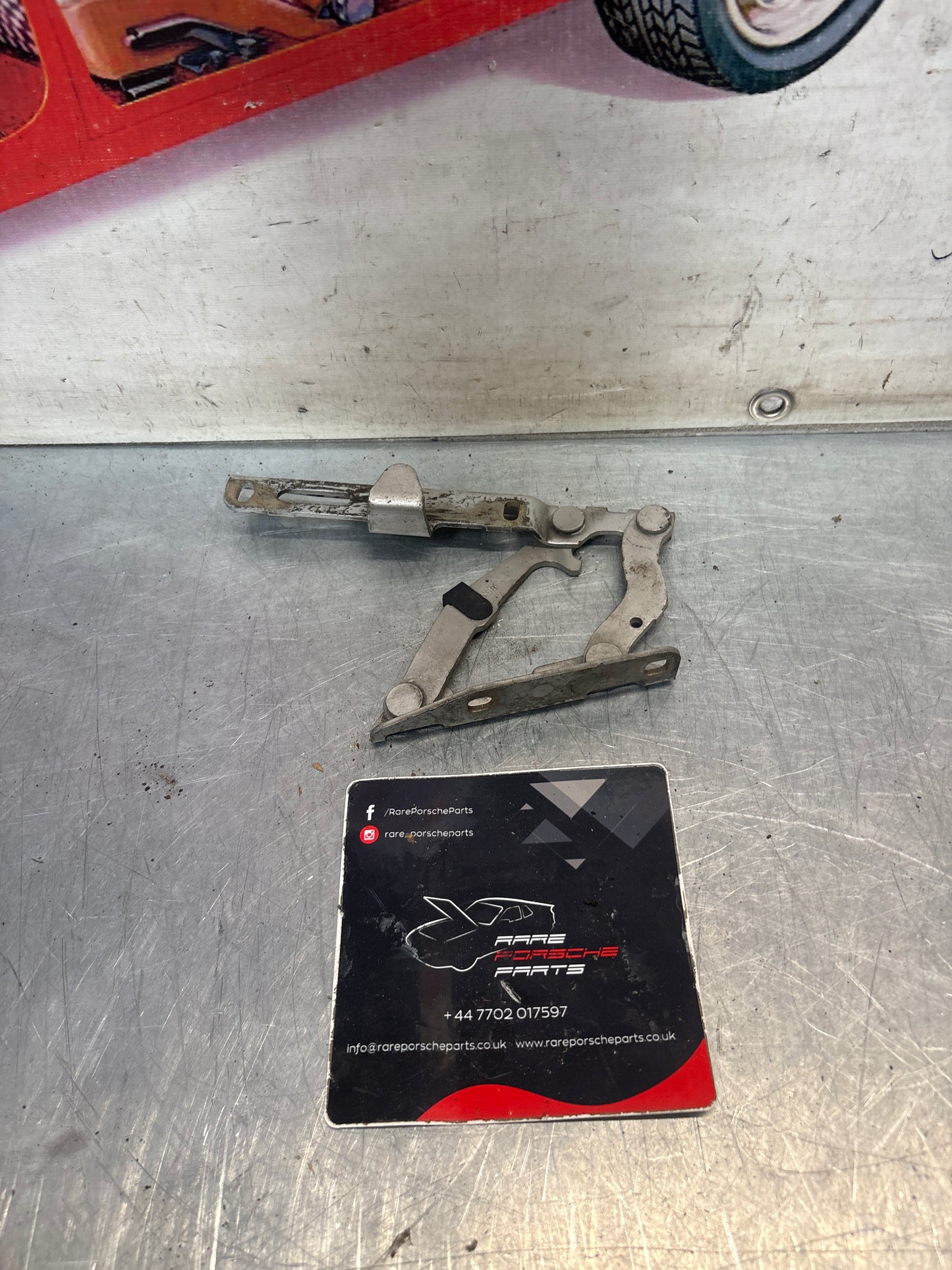 Porsche 911 996 / 986 engine deck lid hinge left side, used 99651215101