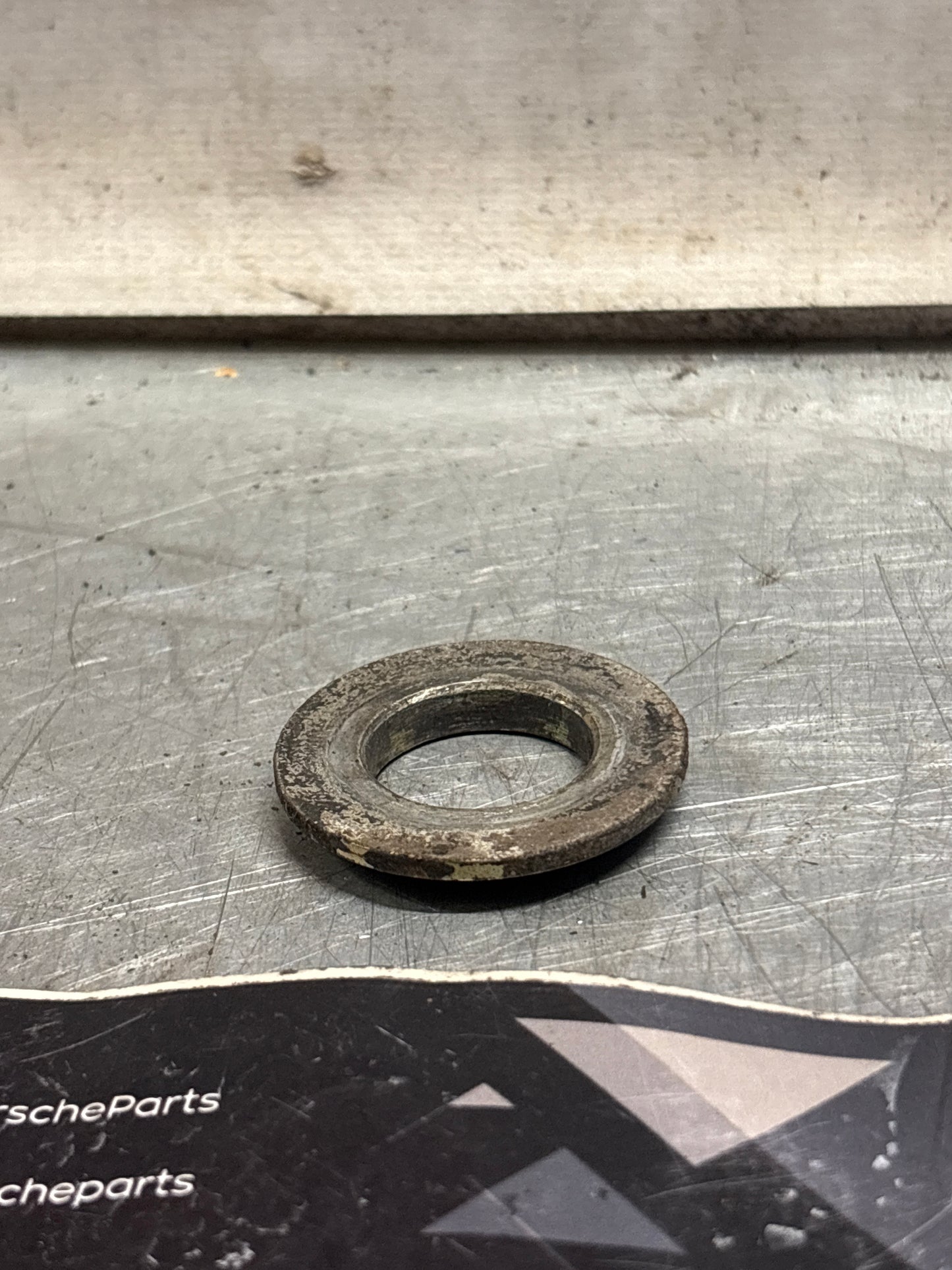 Porsche 928 wishbone bearing pin cone washer, used 92833165506