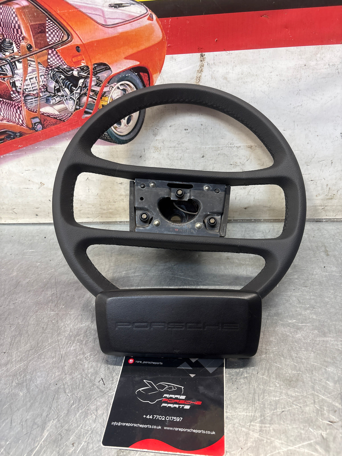 Porsche 928 steering wheel 92834708402, refurbished