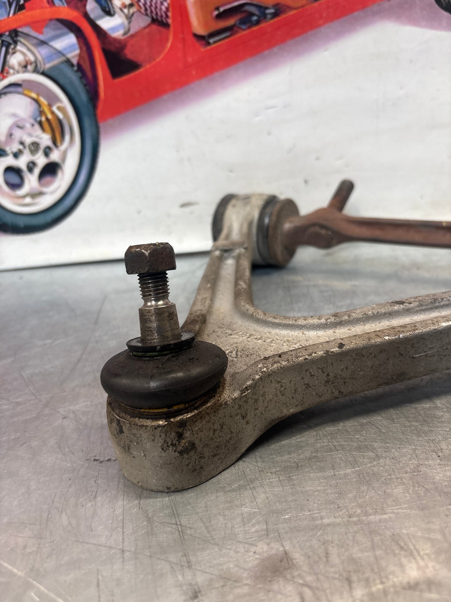 Porsche 928 front upper left control arm, used 92834145722