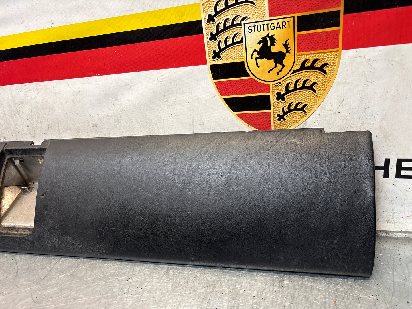 Porsche 911 964 dashboard lower knee protection trim, black leather, used 96455207304 / 96455207300