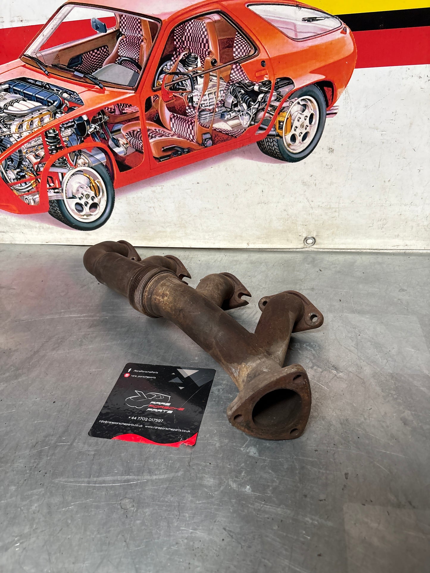 Porsche 928 exhaust manifold, left 92811114505, used